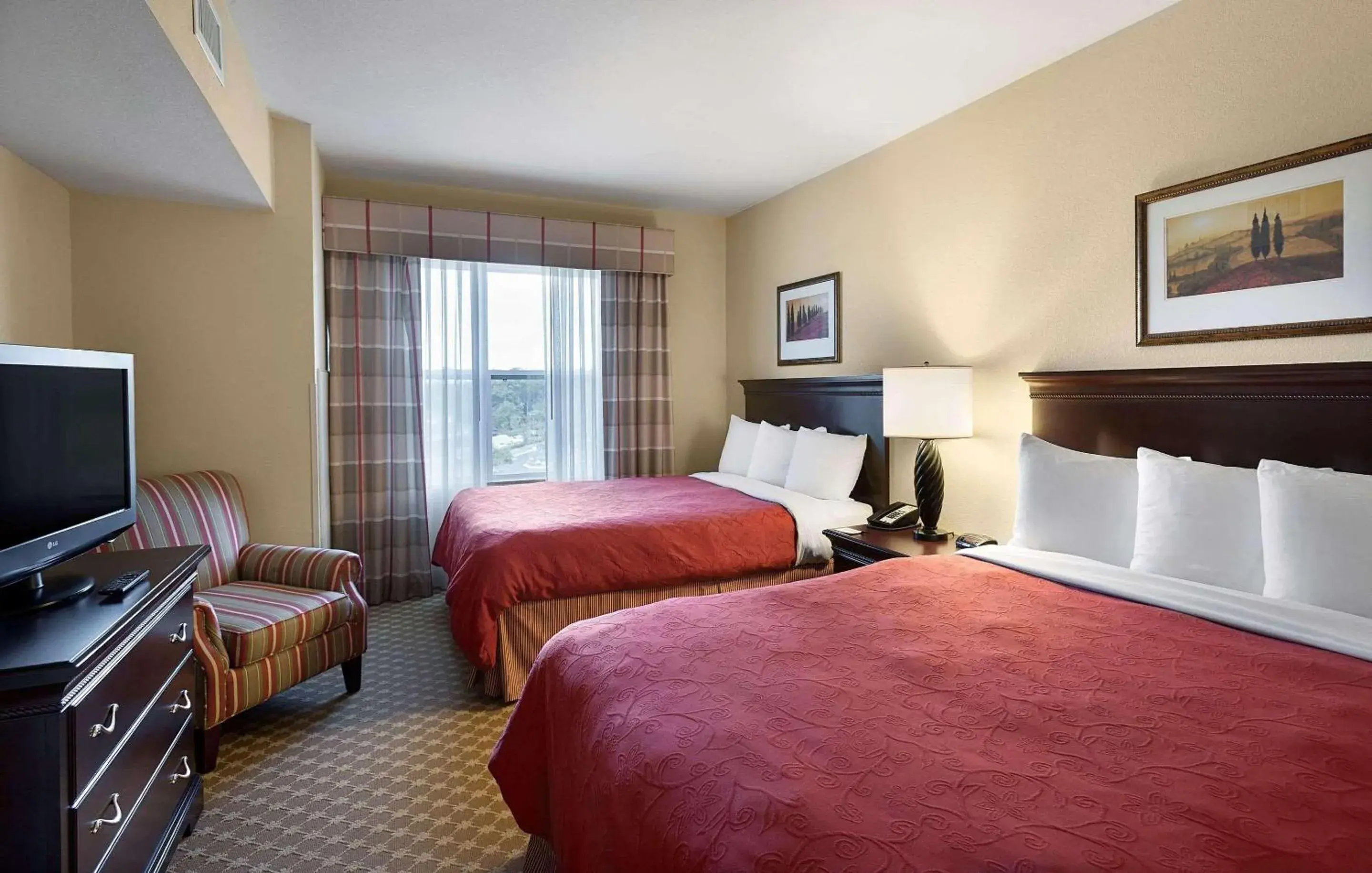 Bedroom, TV/Entertainment Center in Country Inn & Suites by Radisson, Concord (Kannapolis), NC