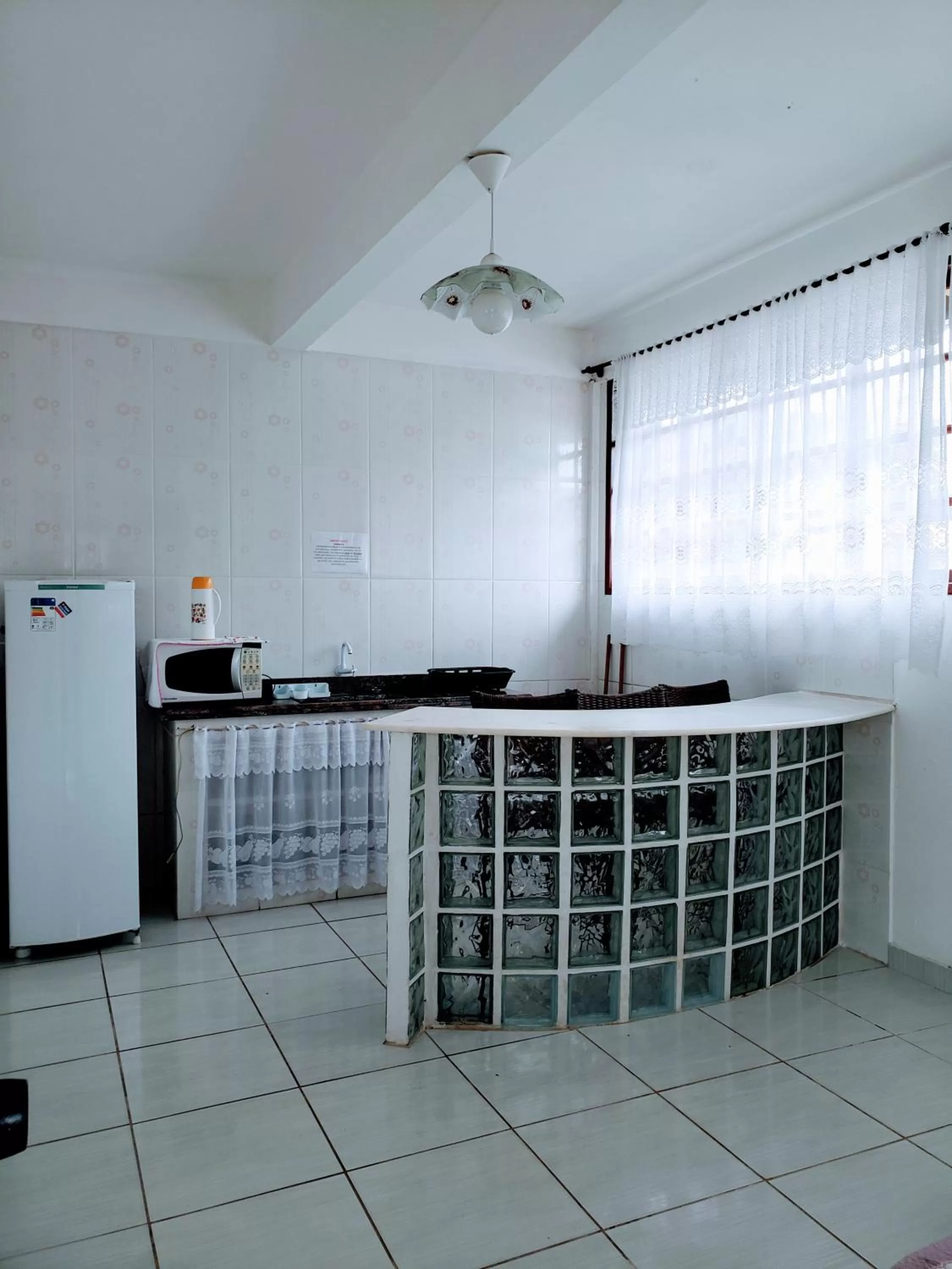 Kitchen/Kitchenette in Pousada Recanto Das Emerências