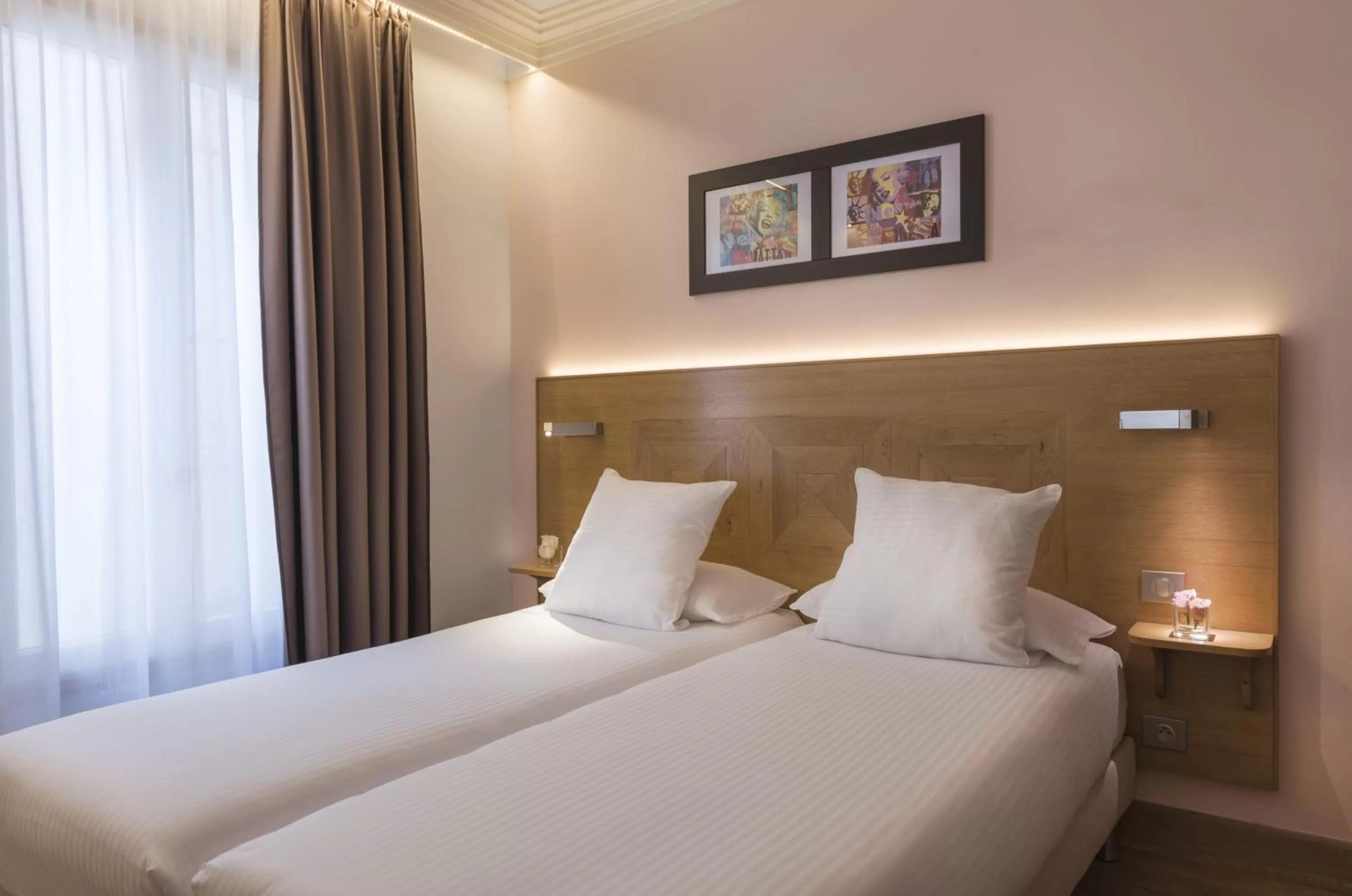 Bed in Hôtel Eiffel XV