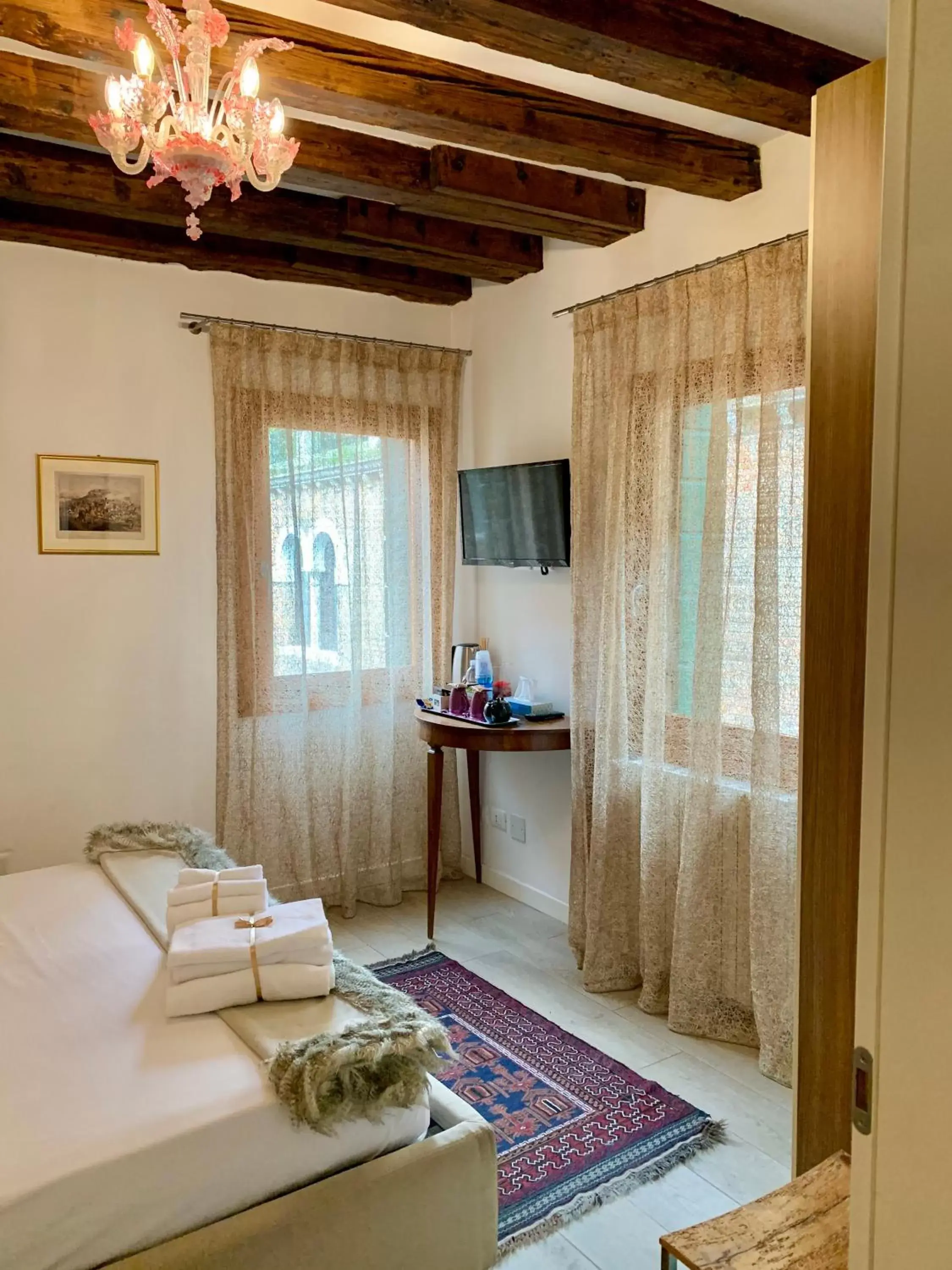 Bed, Seating Area in B&B Fortuny