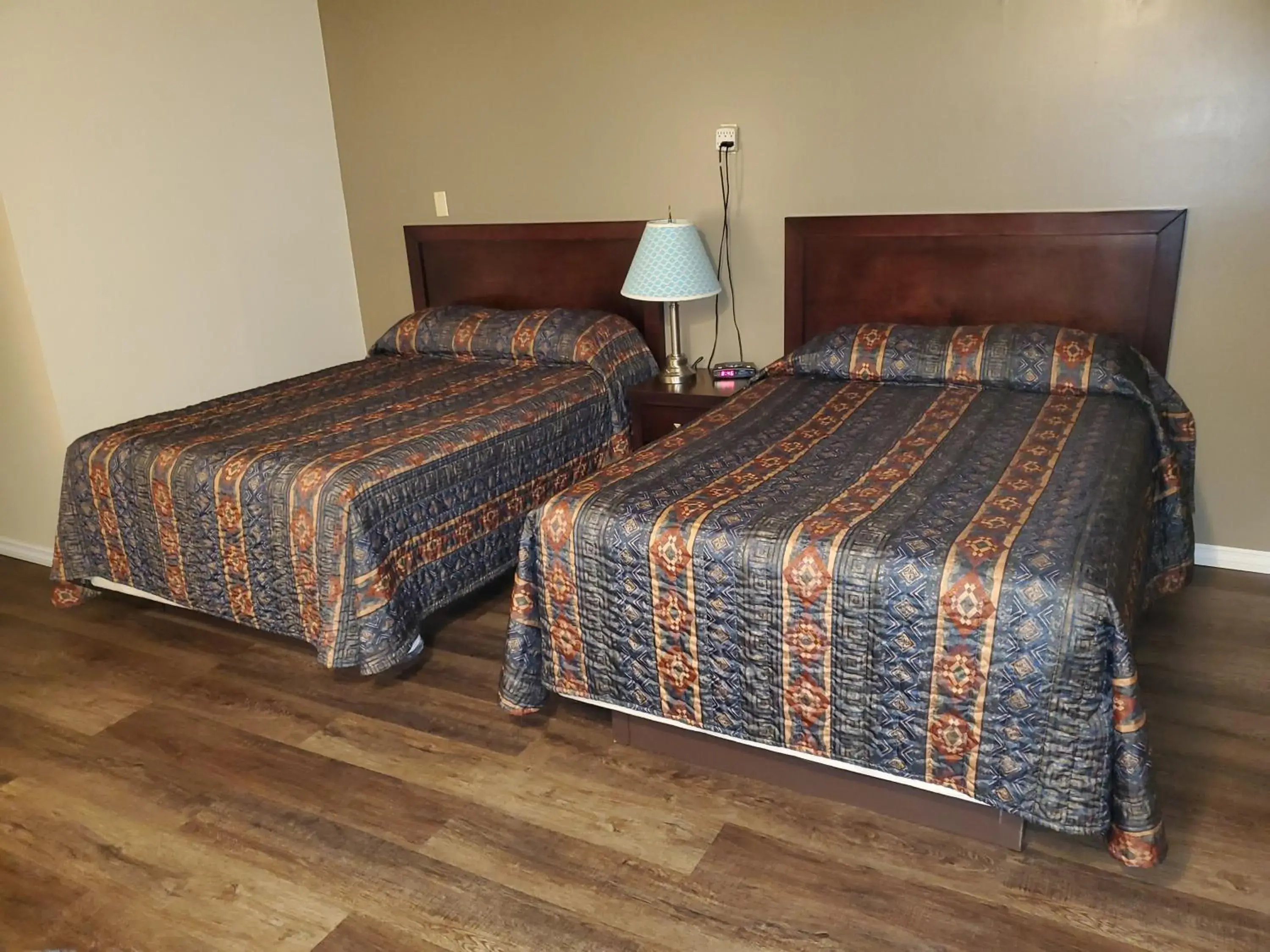 Bed in Battlefords Inn