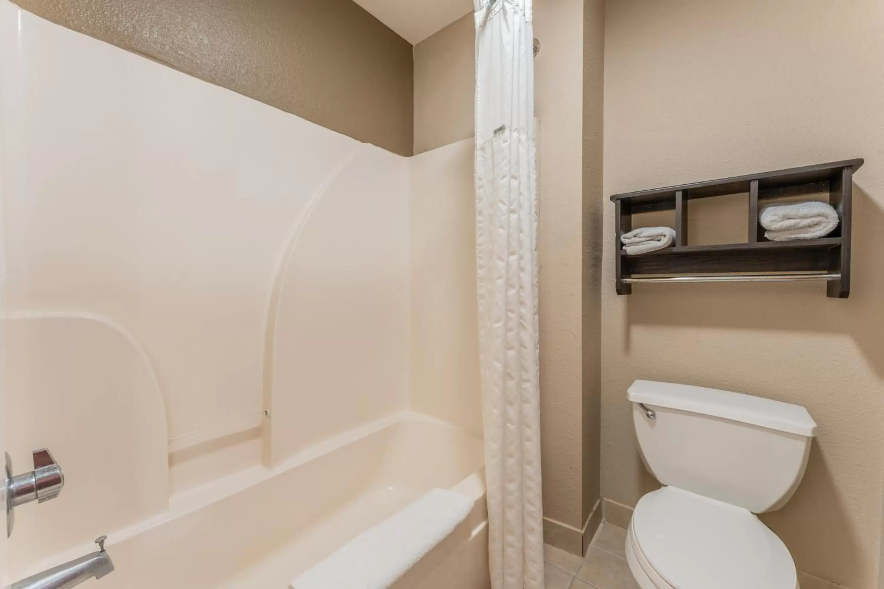 Bathroom in Super 8 by Wyndham Lake Charles Northeast