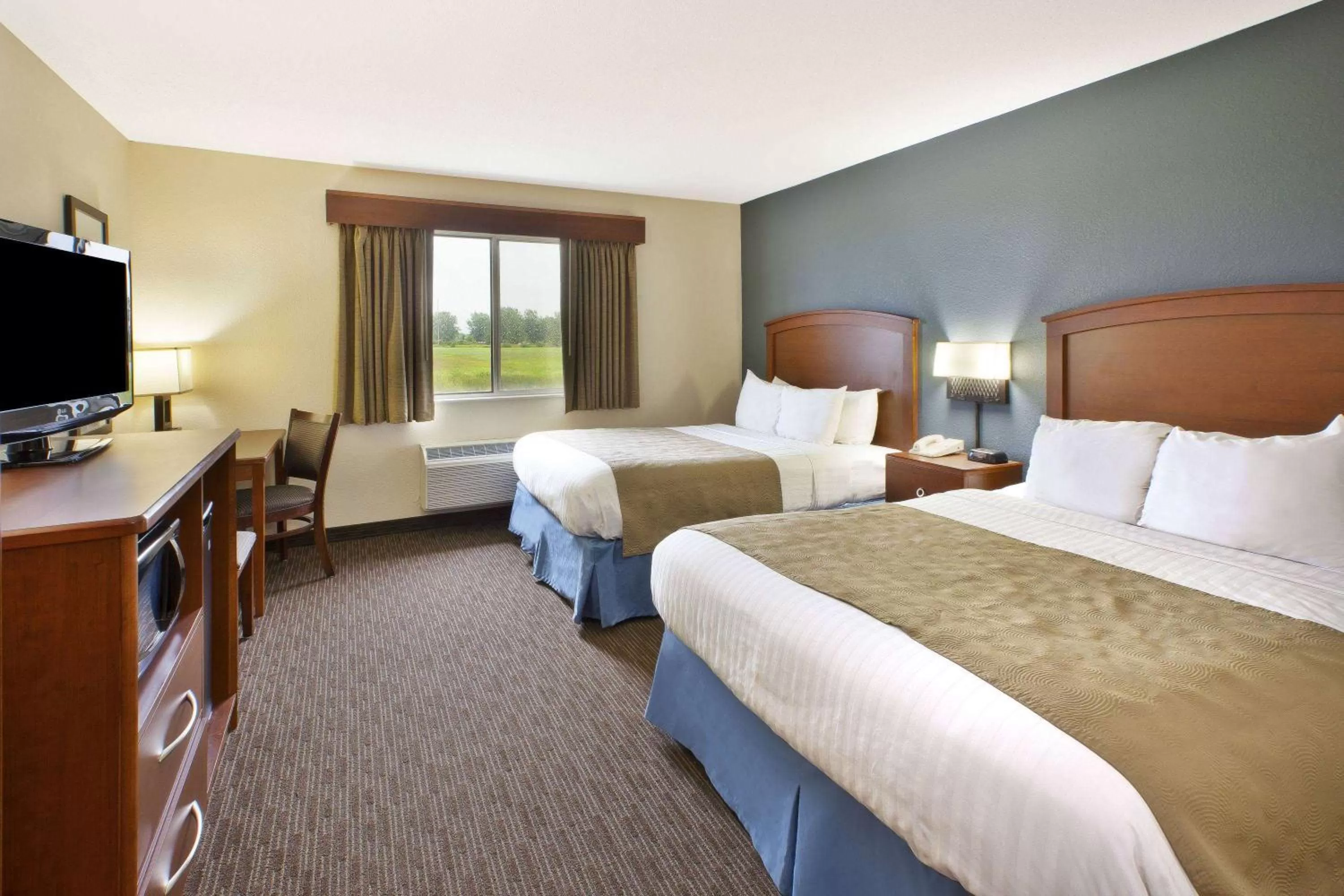 Photo of the whole room, Bed in AmericInn by Wyndham Bay City