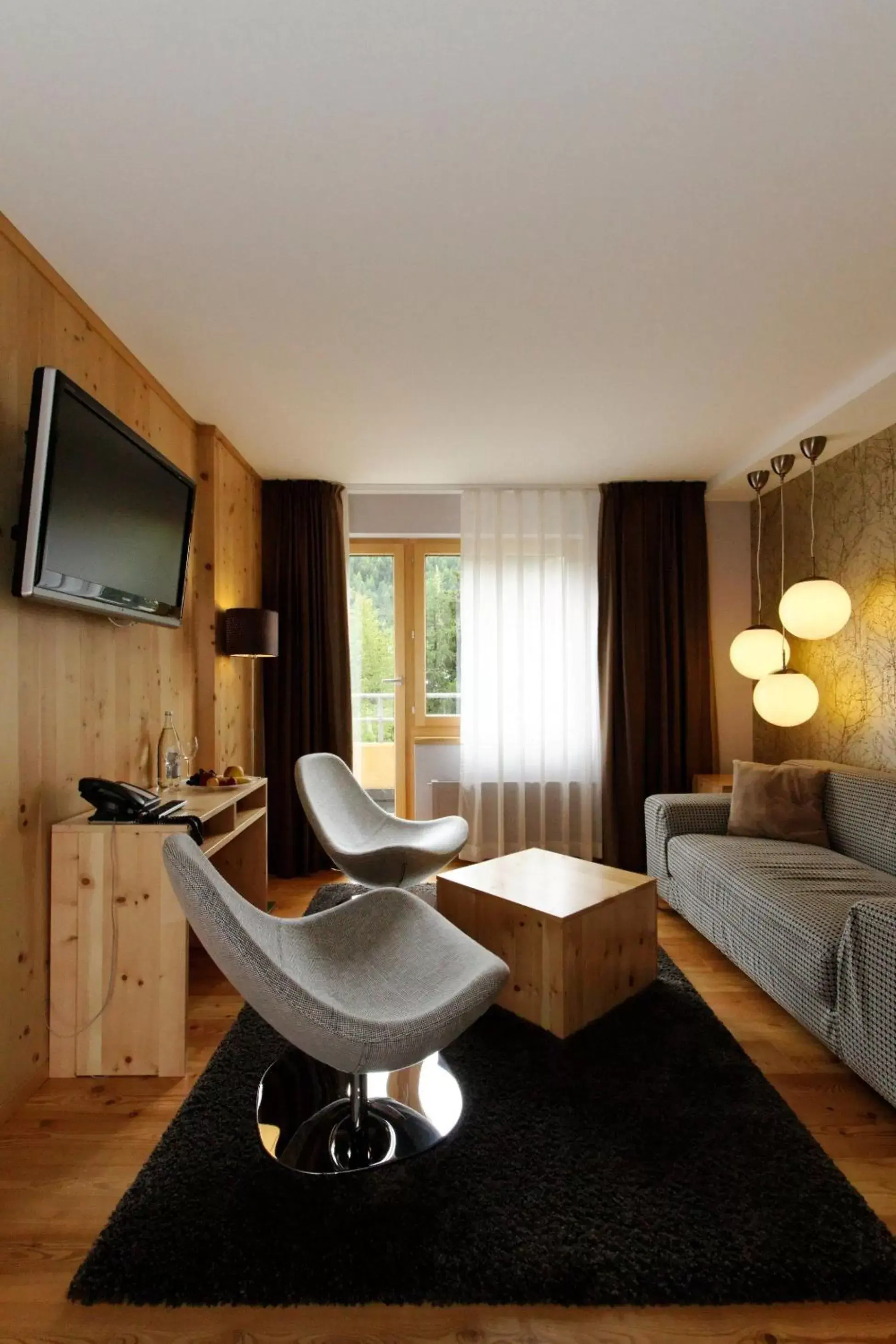 Living room, Bathroom in Hotel Laudinella