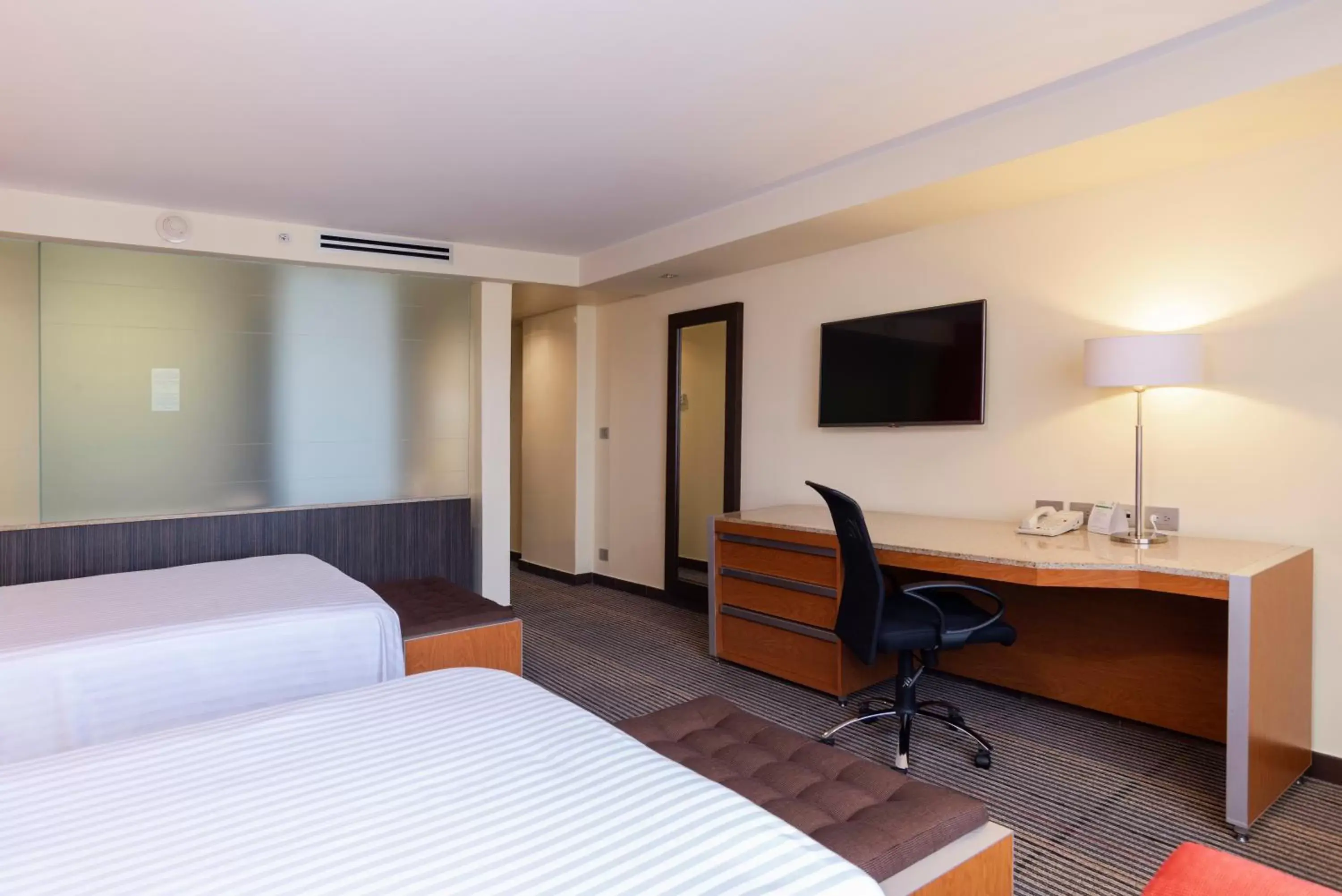 Bedroom in Holiday Inn Mexico City-Plaza Universidad, an IHG Hotel