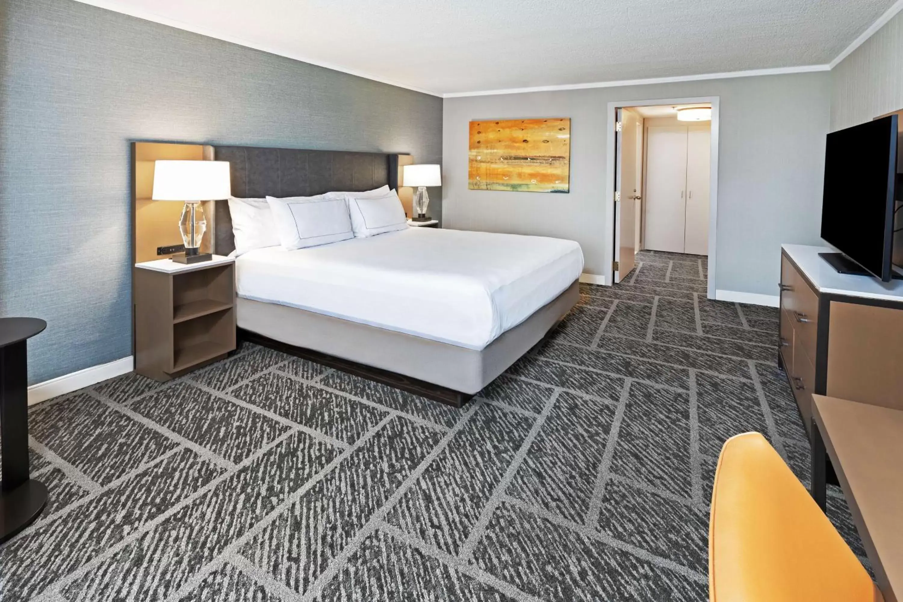 Bed in DoubleTree by Hilton Tulsa at Warren Place