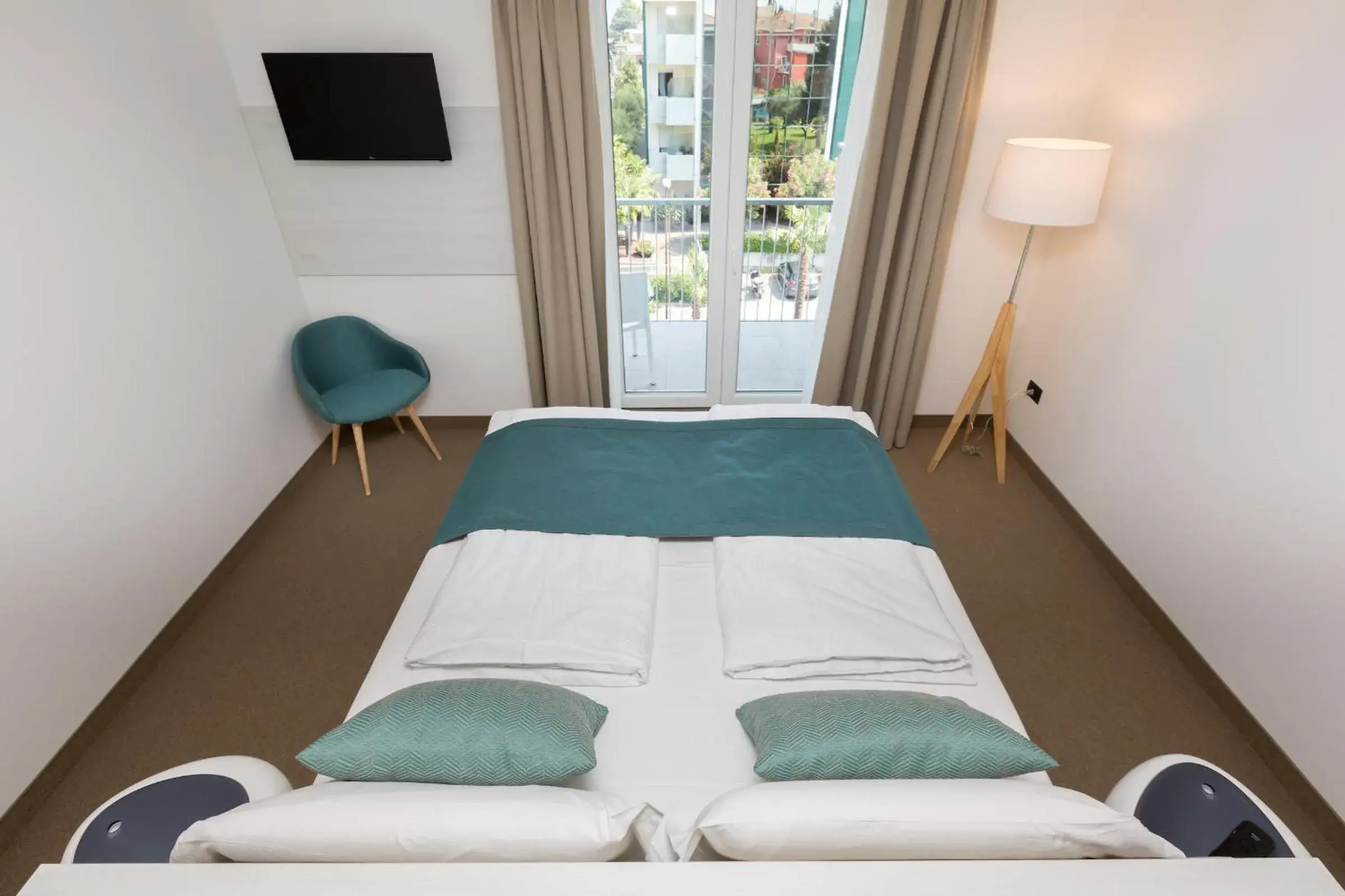 Bed in Brione Green Resort