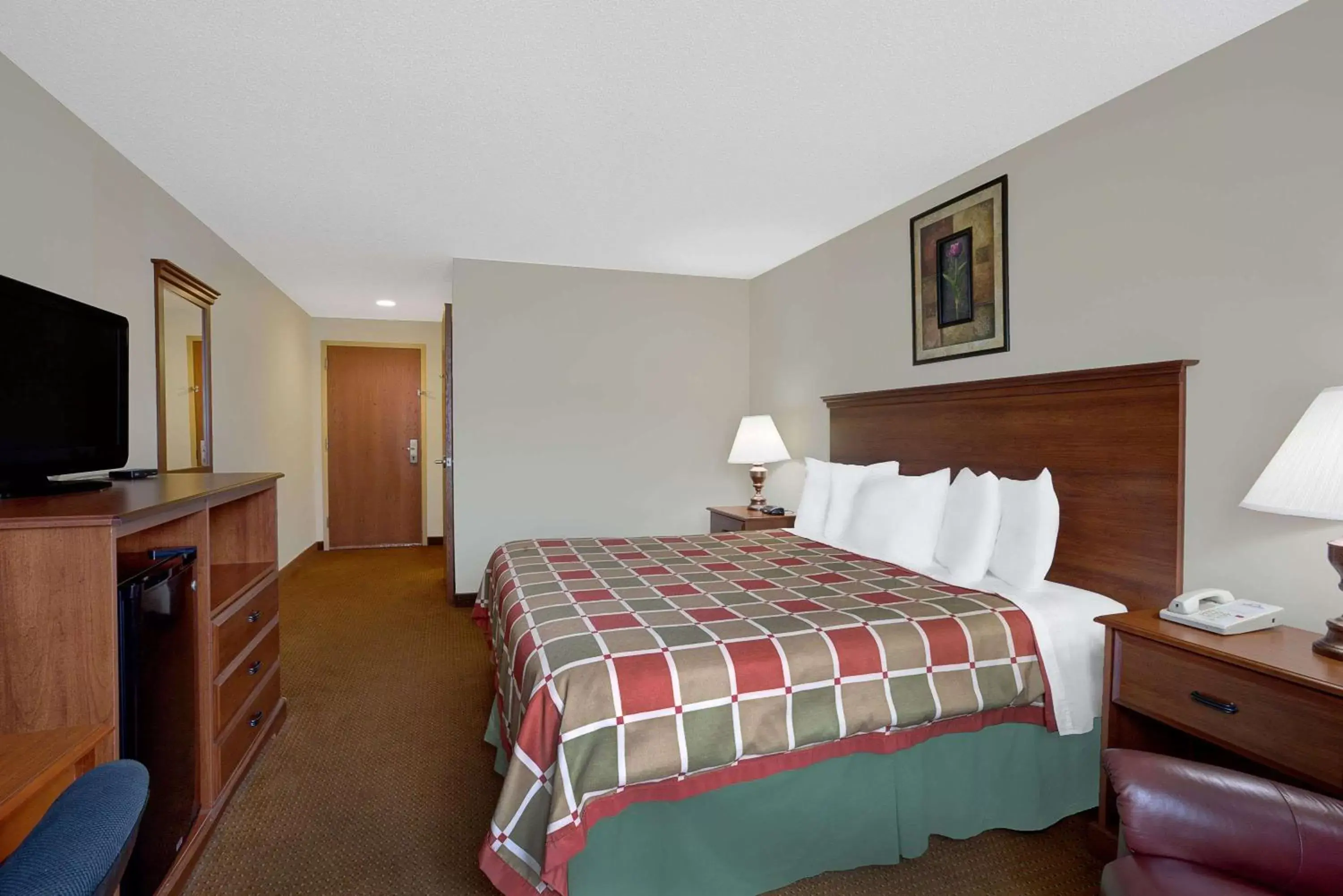 Photo of the whole room, Bed in Days Inn by Wyndham Greensboro NC