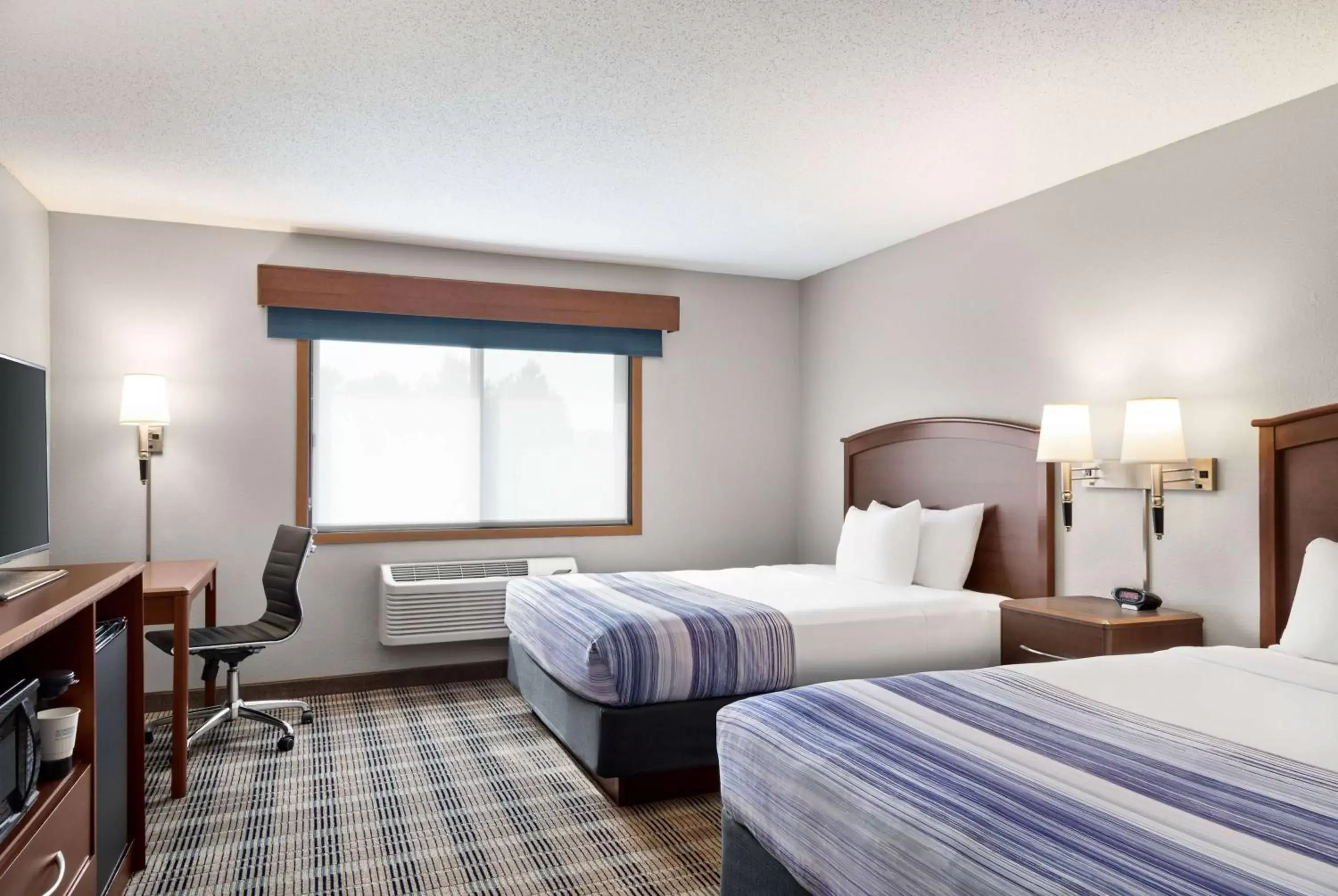 Queen Room with Two Queen Beds - Non-Smoking in AmericInn by Wyndham Bemidji
