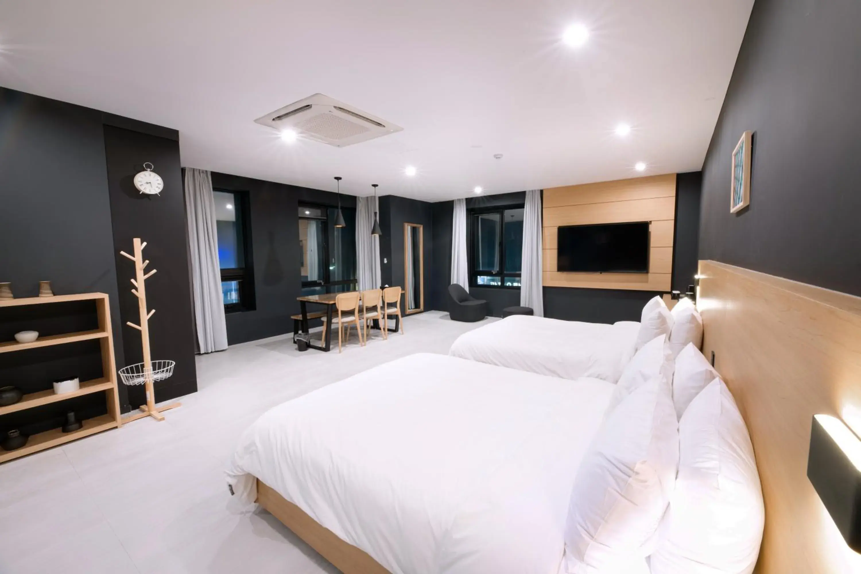 Bed in Mipo Oceanside Hotel Bed in Mipo Oceanside Hotel