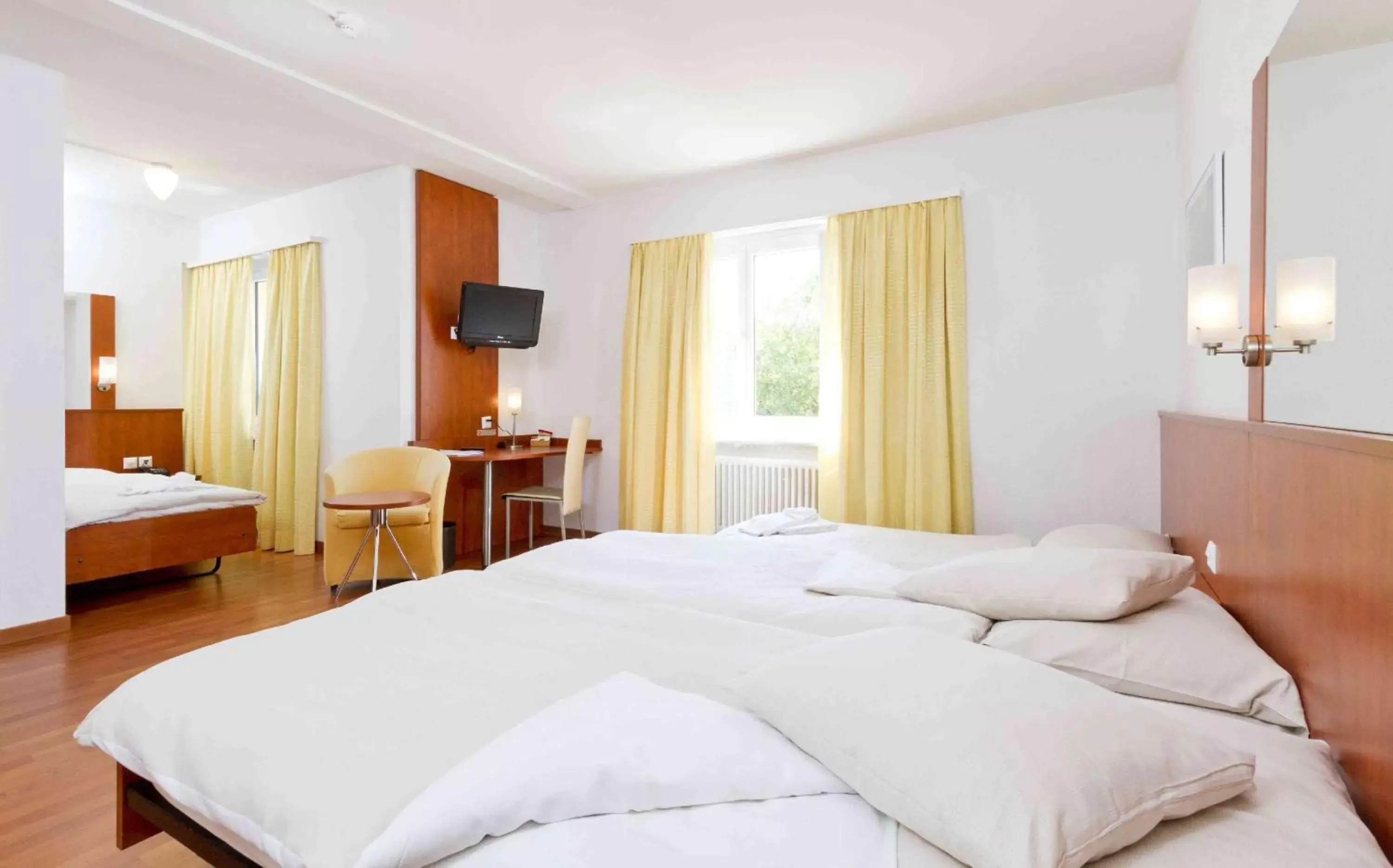 Standard Triple Room in Sorell Hotel Sonnental