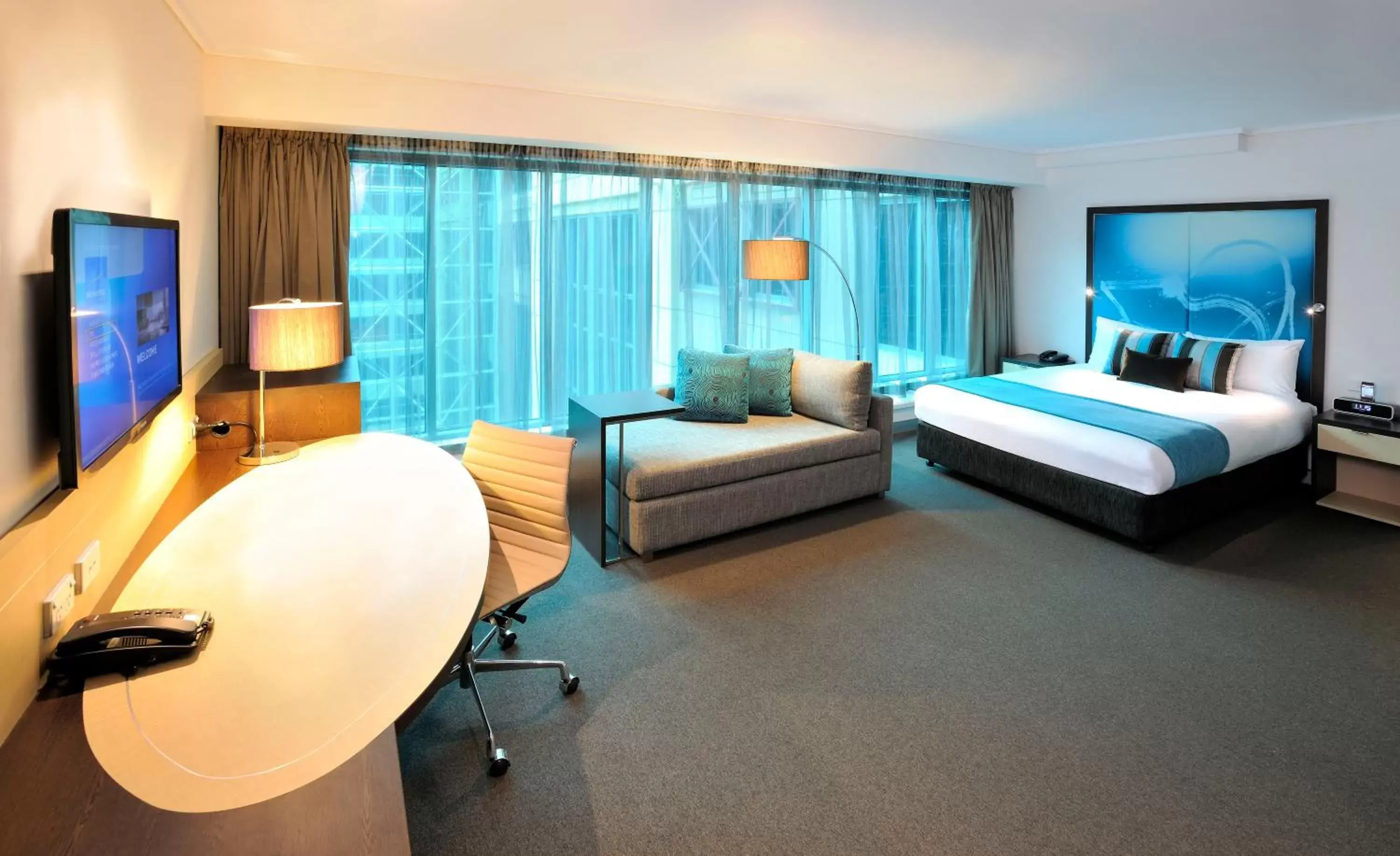 Bed in Novotel Melbourne On Collins