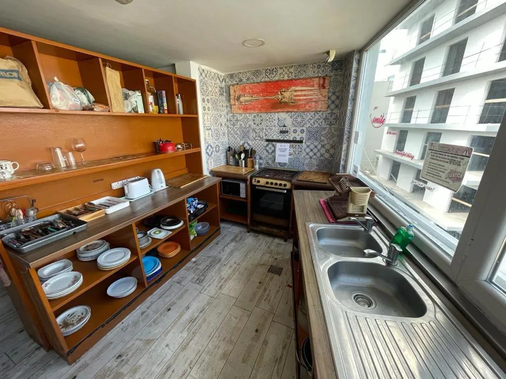 Communal kitchen in Marco Polo Party Hostel