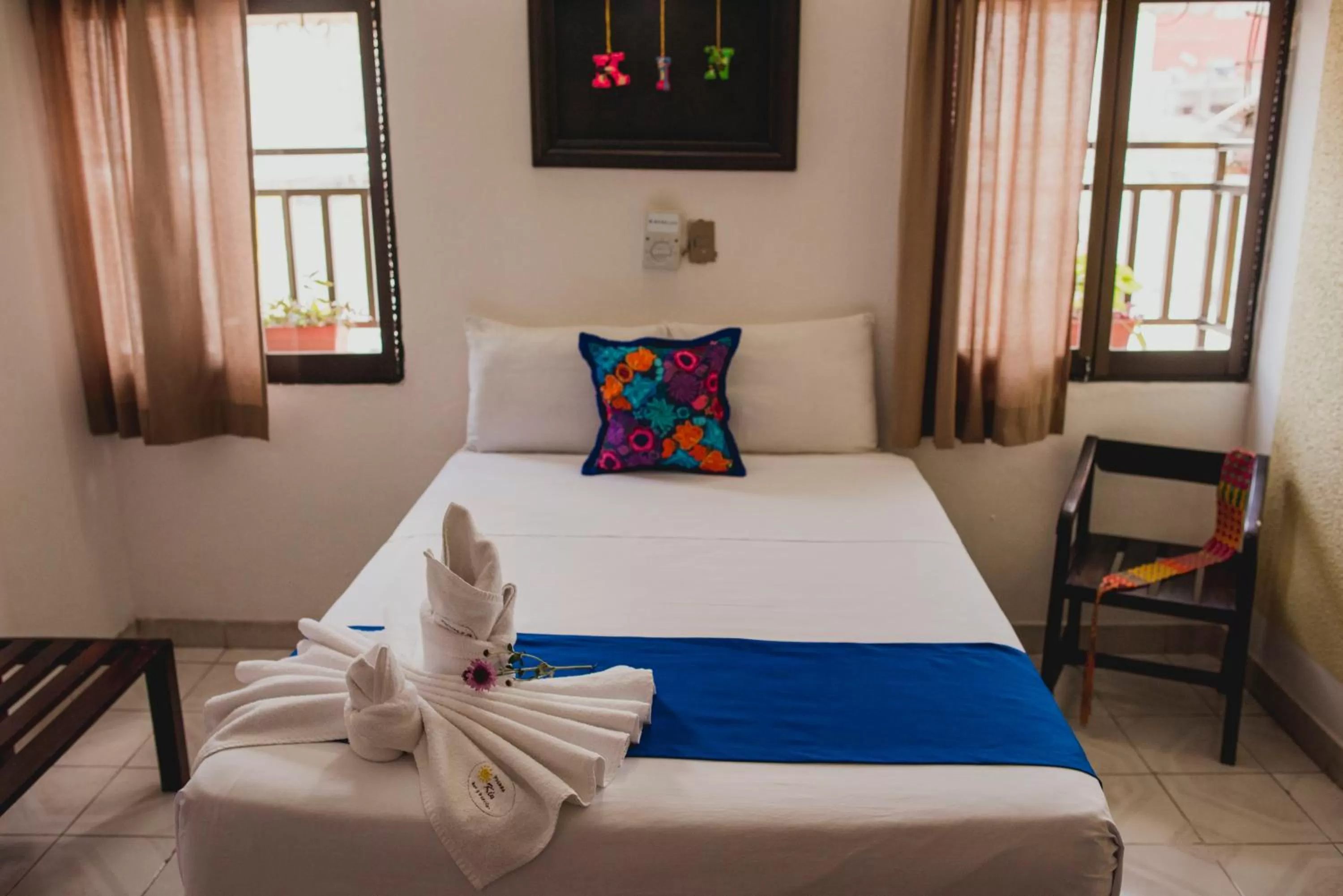 Photo of the whole room, Bed in Posada Kin