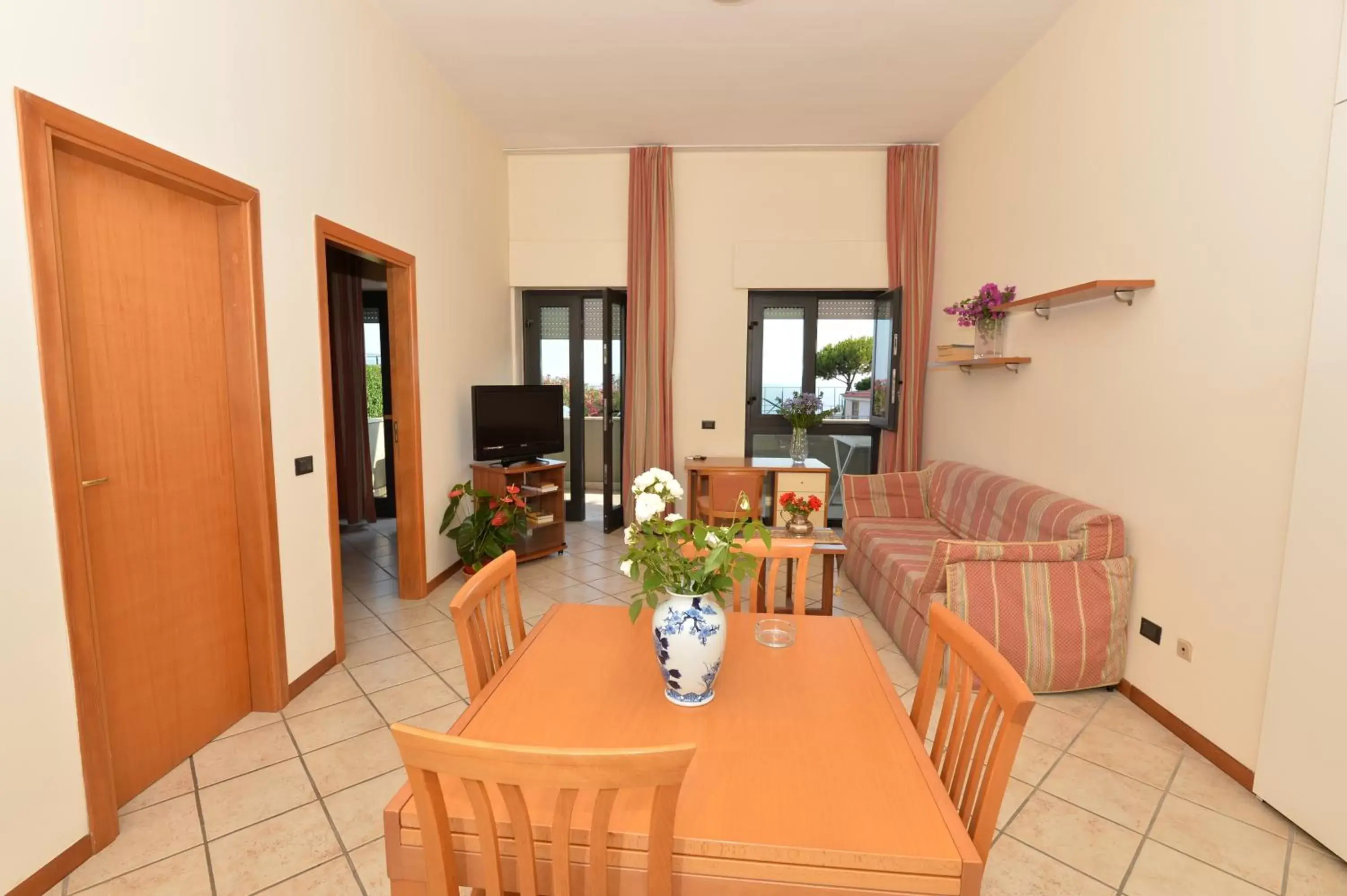 Living room, Dining Area in Miramare Residence