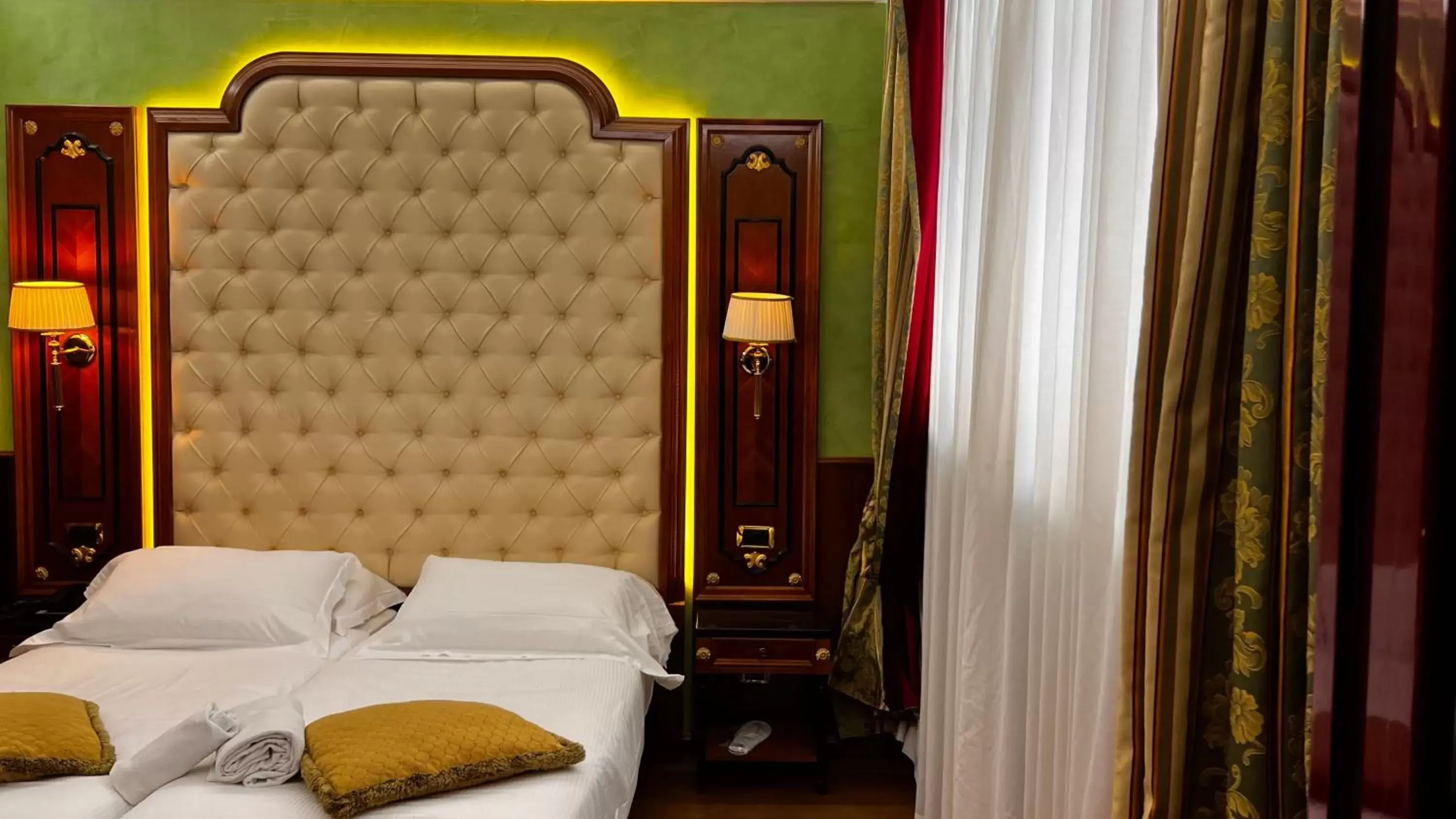 Bed in Hotel Vittoria