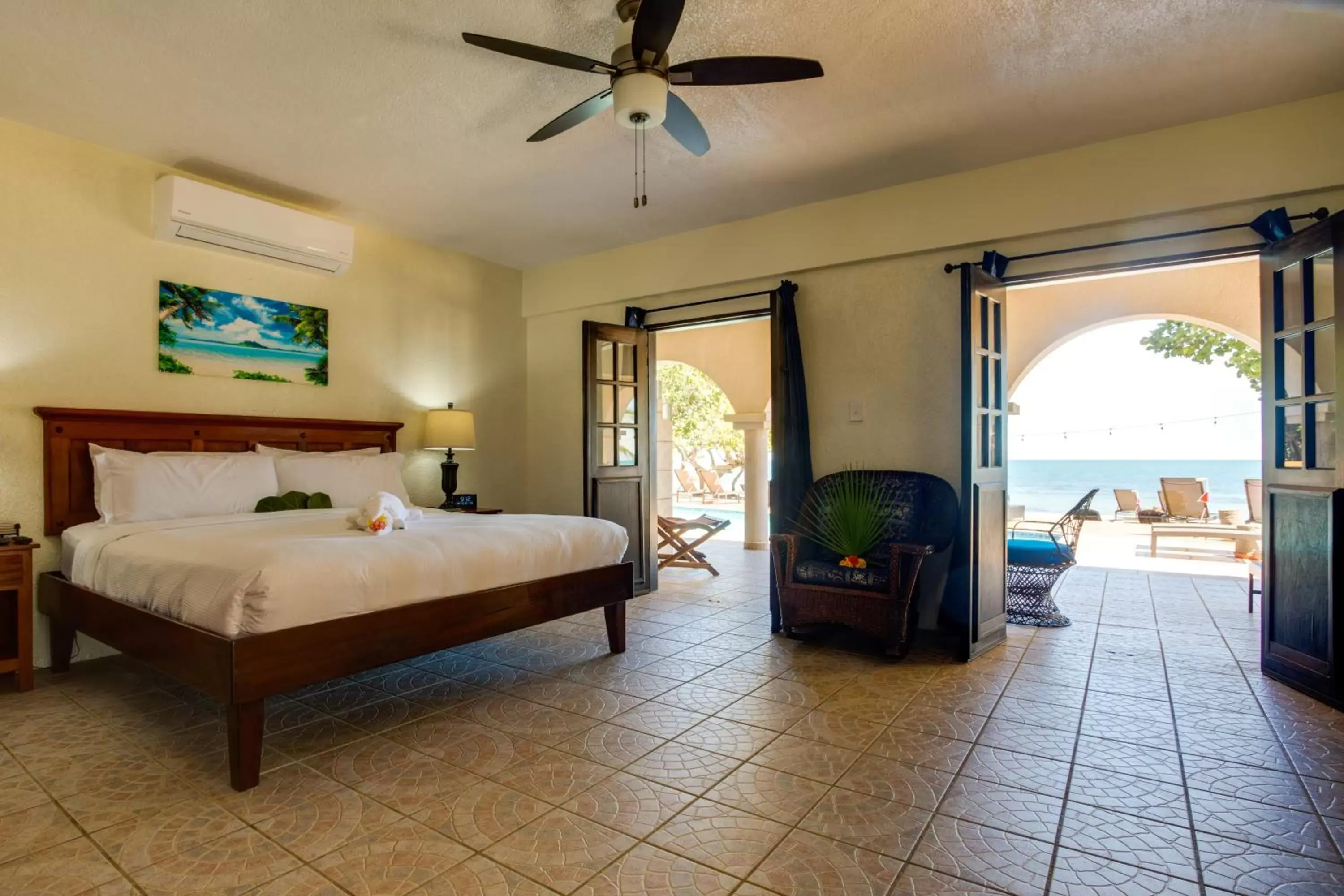 Bed in Mariposa Belize Beach Resort