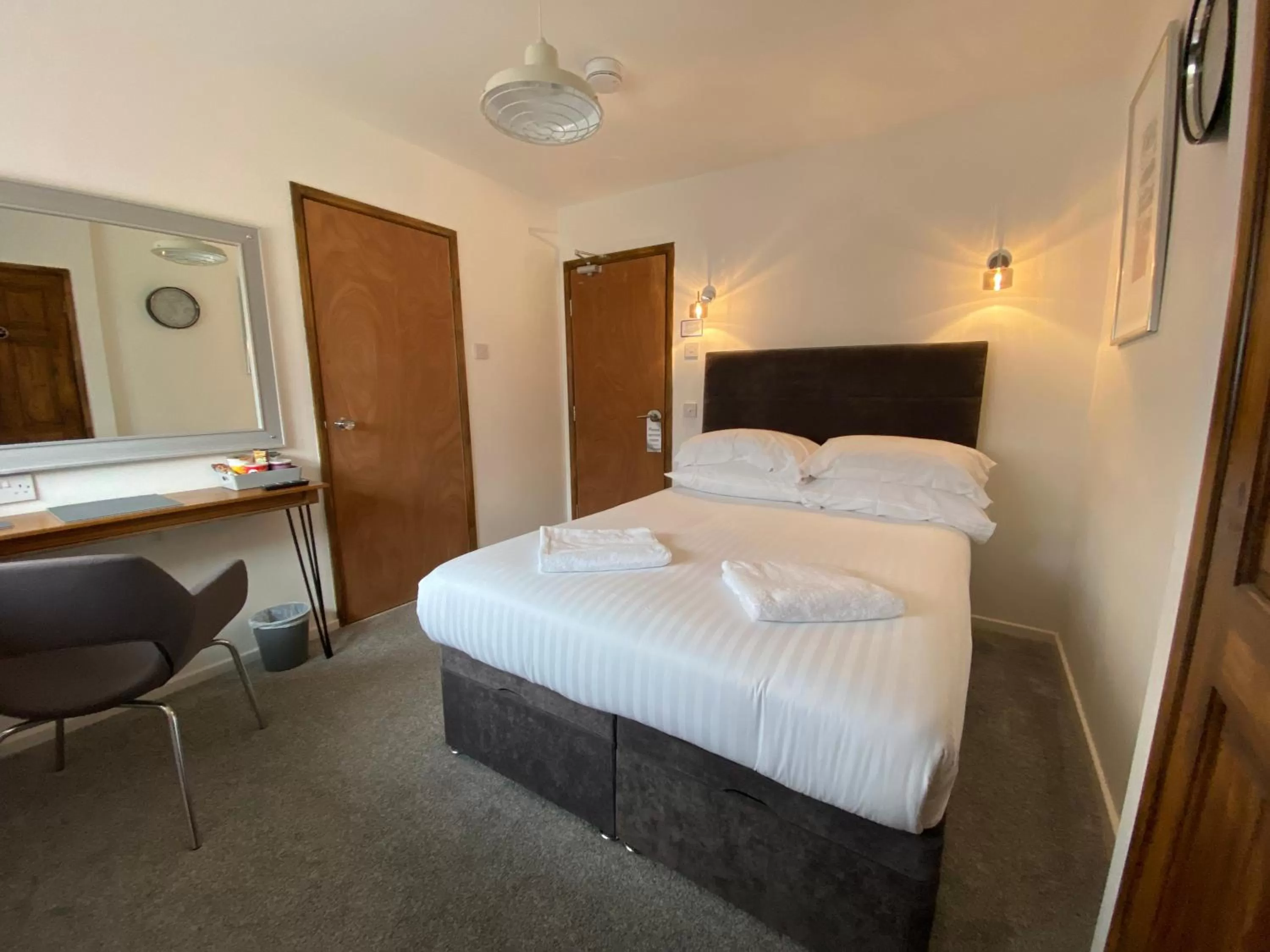 Bed in The Crossroads Inn