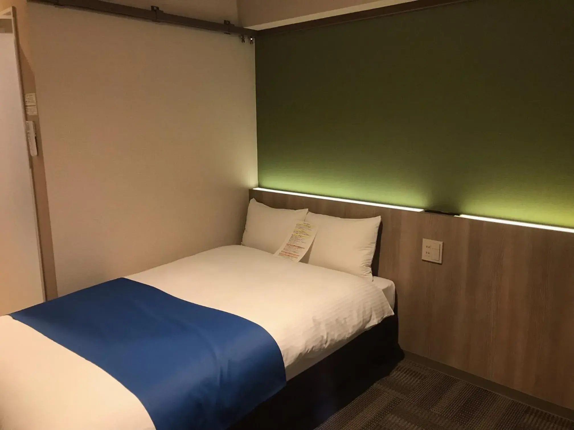 Bed in Hotel Lantana Naha Matsuyama