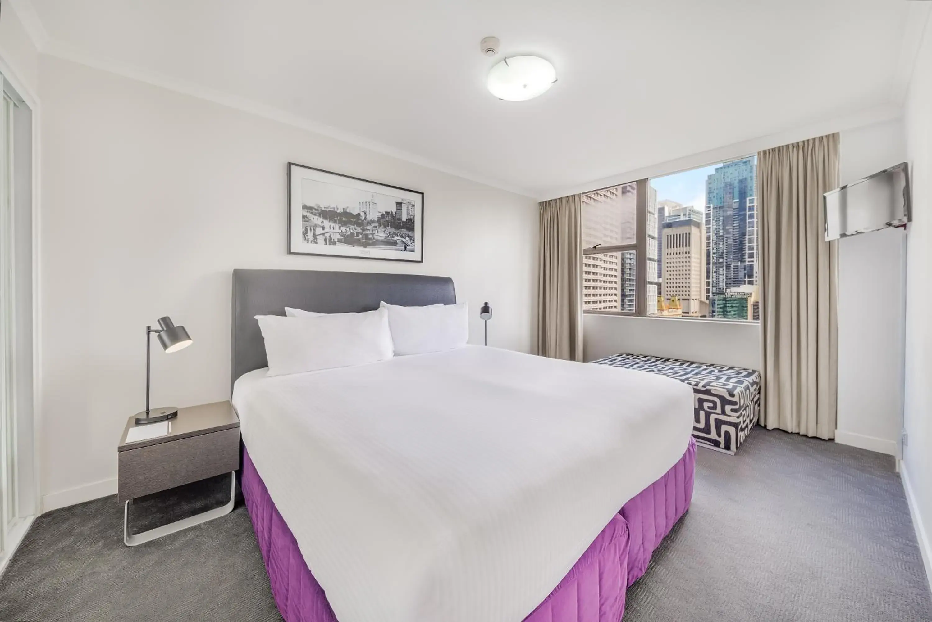 Bed in Oaks Sydney Hyde Park Suites