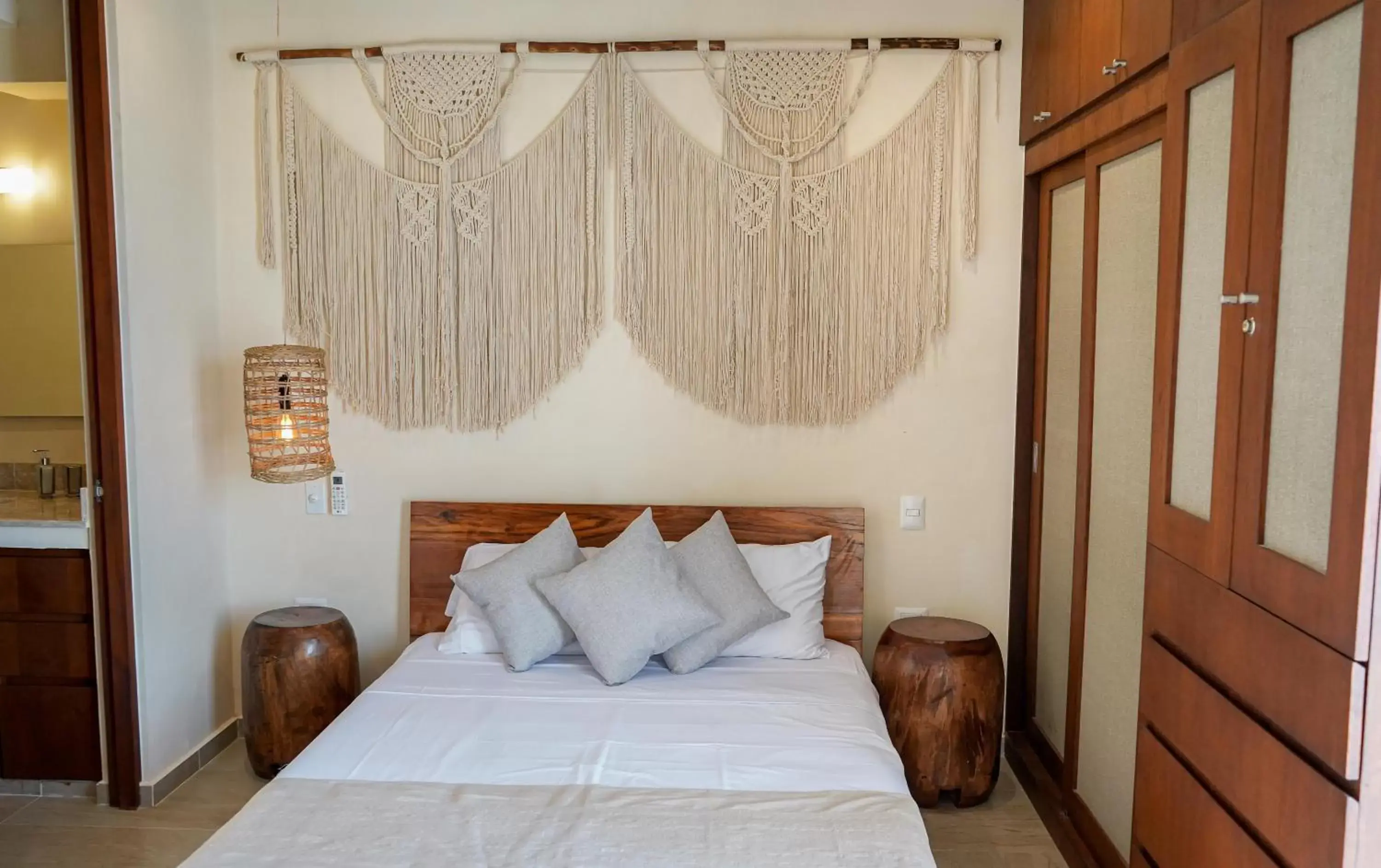 Bed in ARUNA TULUM-Luxury Studios & Apartments