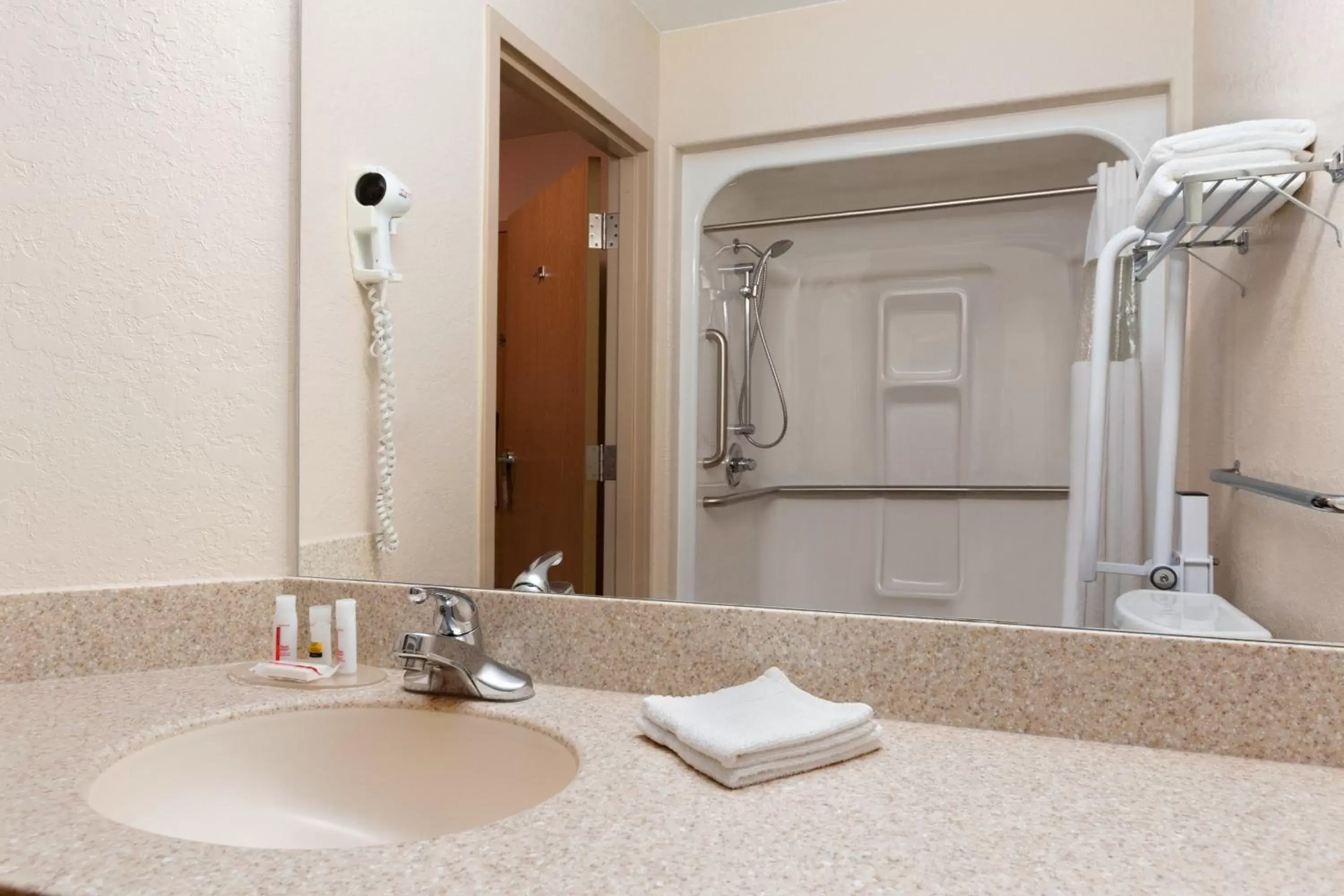 Shower, Bathroom in Days Inn & Suites by Wyndham Winkler