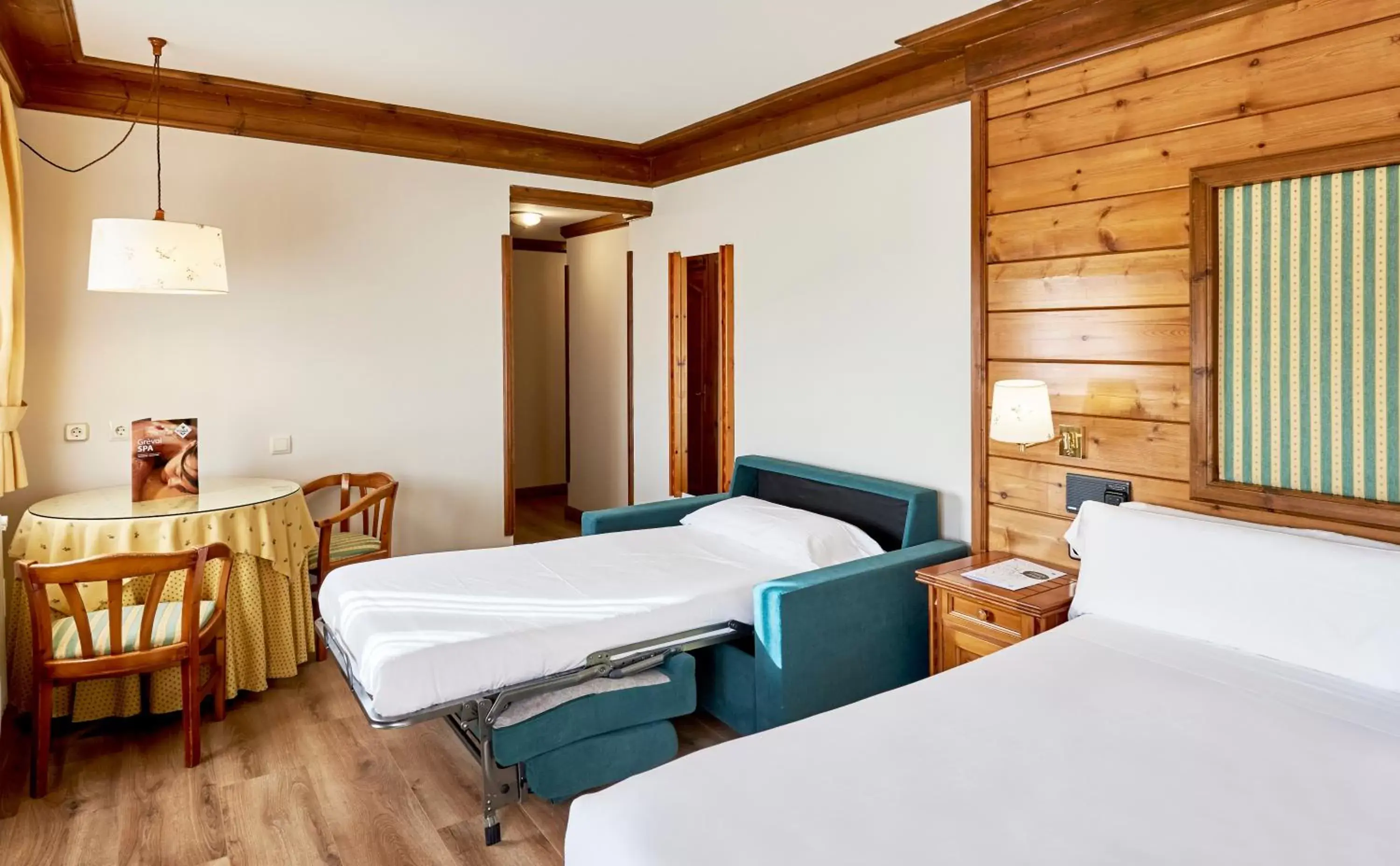 Bed in Hotel Grèvol Spa