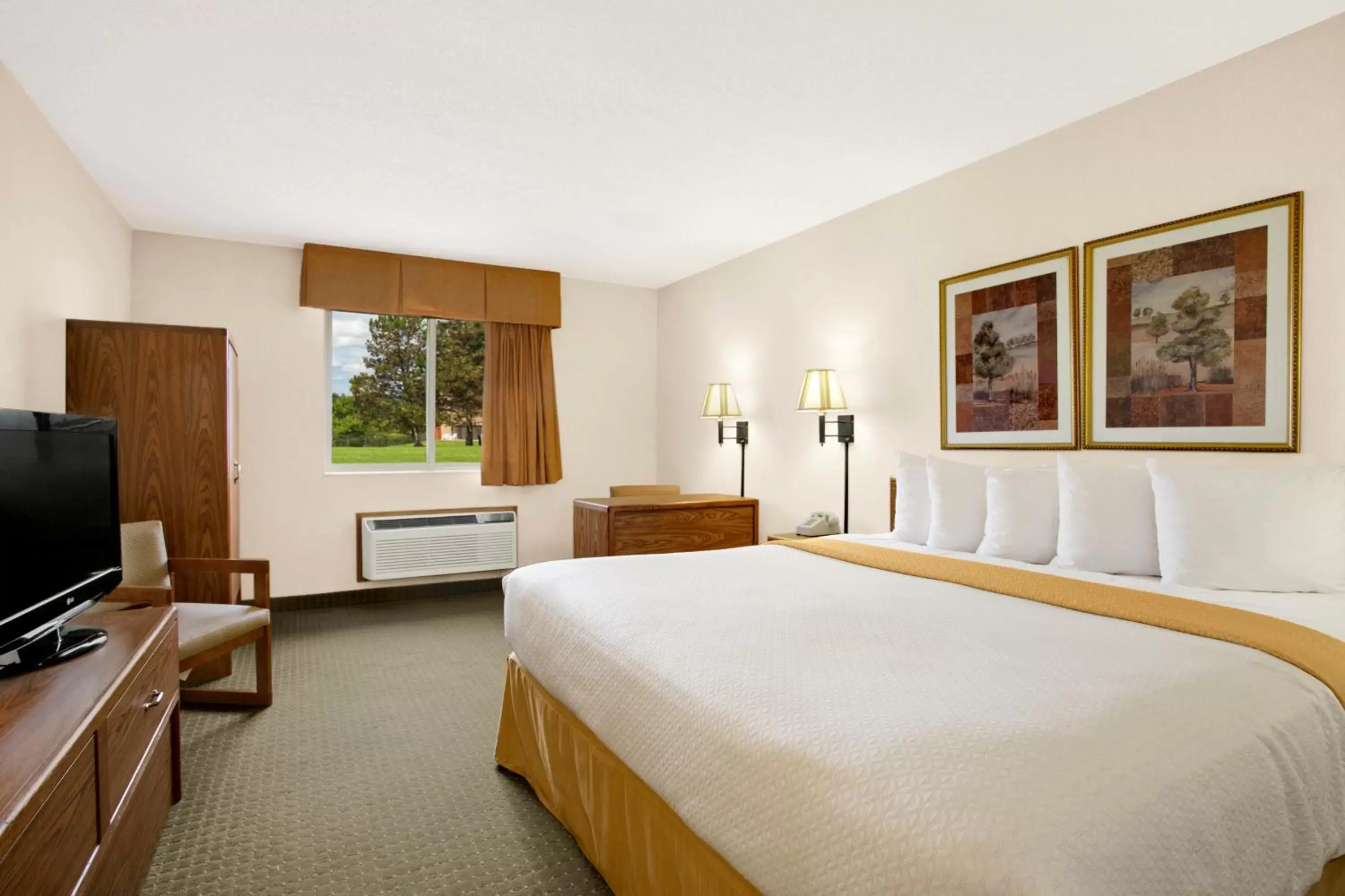 Bed in Days Inn by Wyndham Rapid City