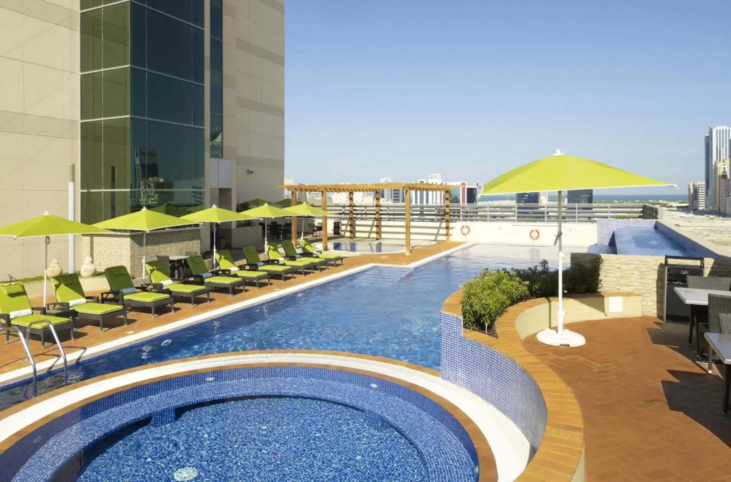 Balcony/Terrace, Swimming Pool in Fraser Suites Seef Bahrain