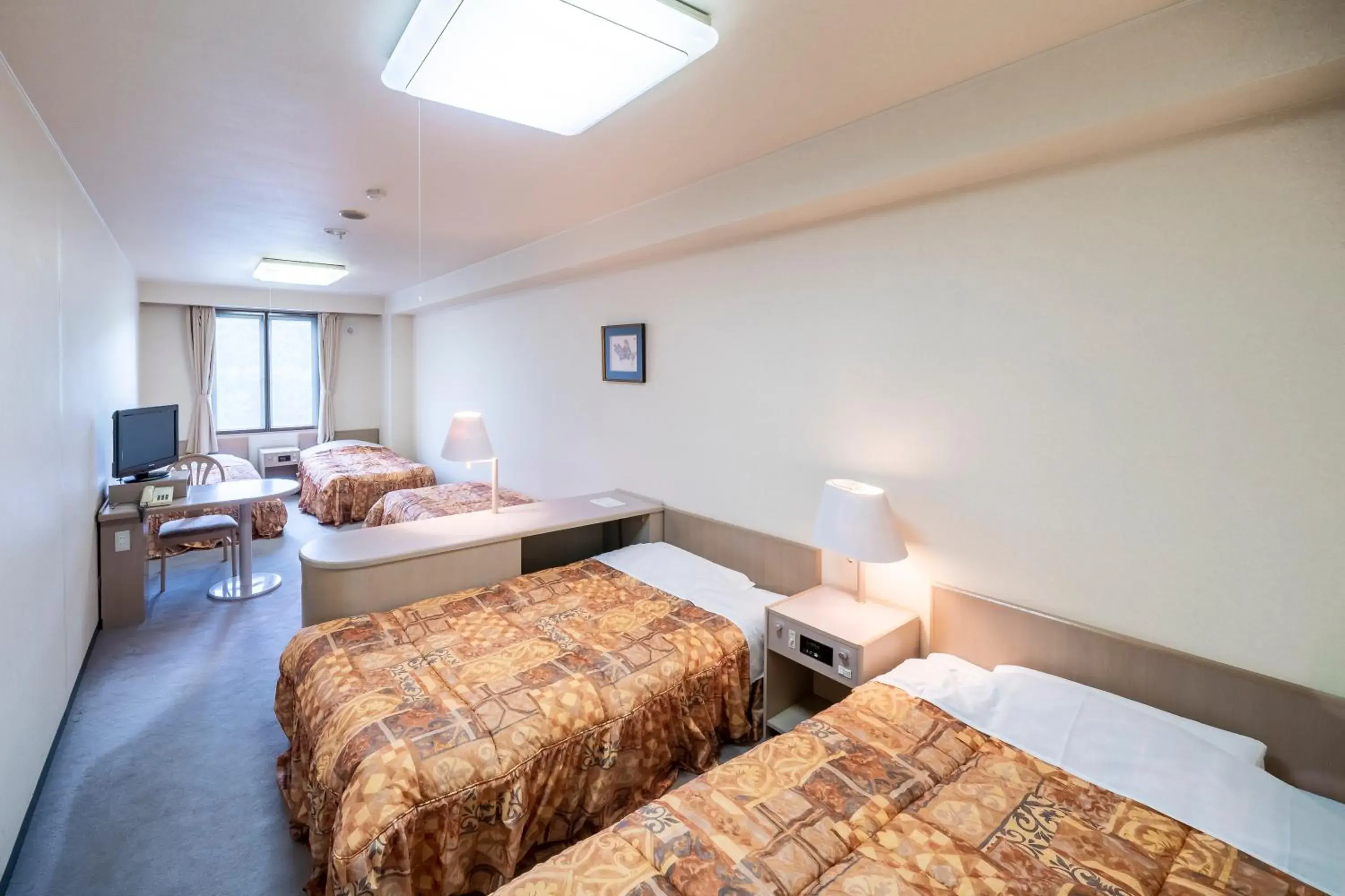 Bed in Hotel Tagawa