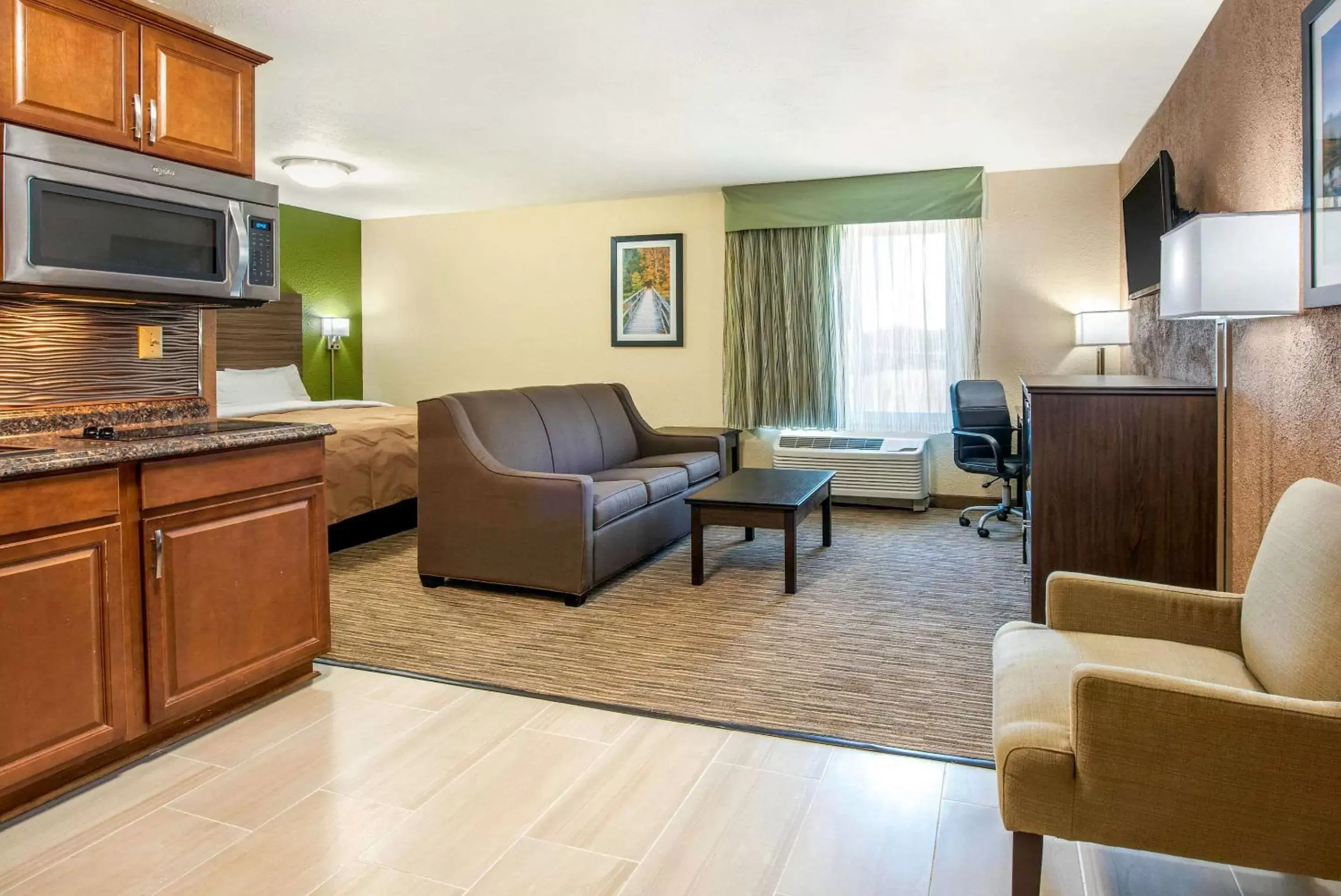 Bedroom, Seating Area in Quality Inn & Suites