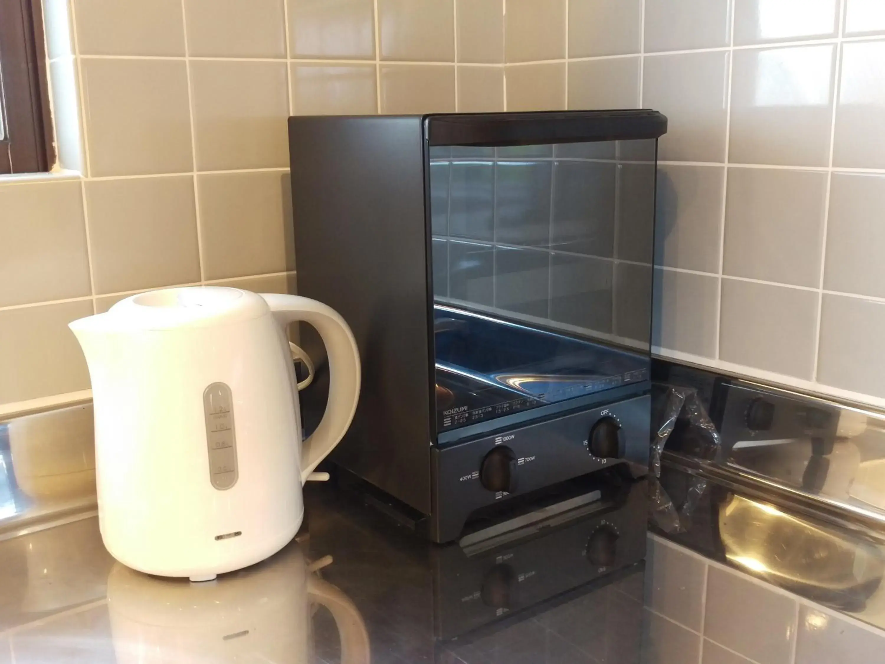 toaster, Kitchen/Kitchenette in Kariyushi Condominium Resort Nanjo Atelier Hyakuna