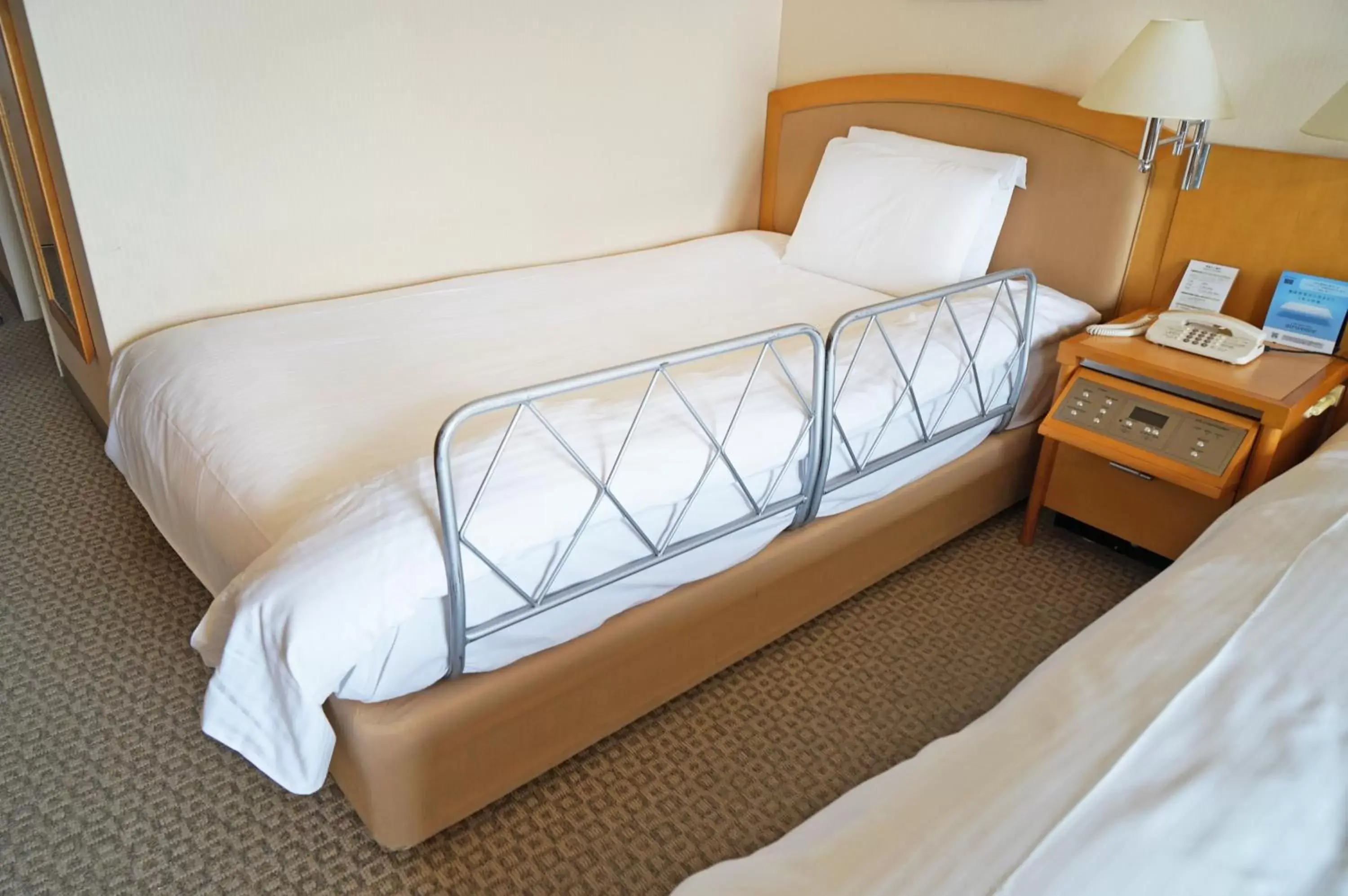 Bed in Royal Pines Hotel Urawa