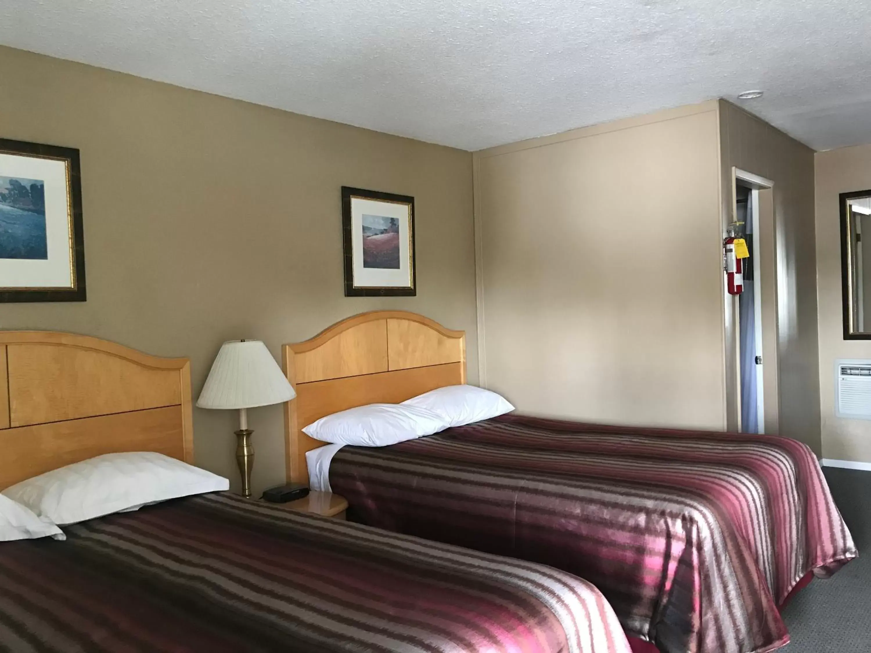 Photo of the whole room, Bed in Bulkley Valley Motel