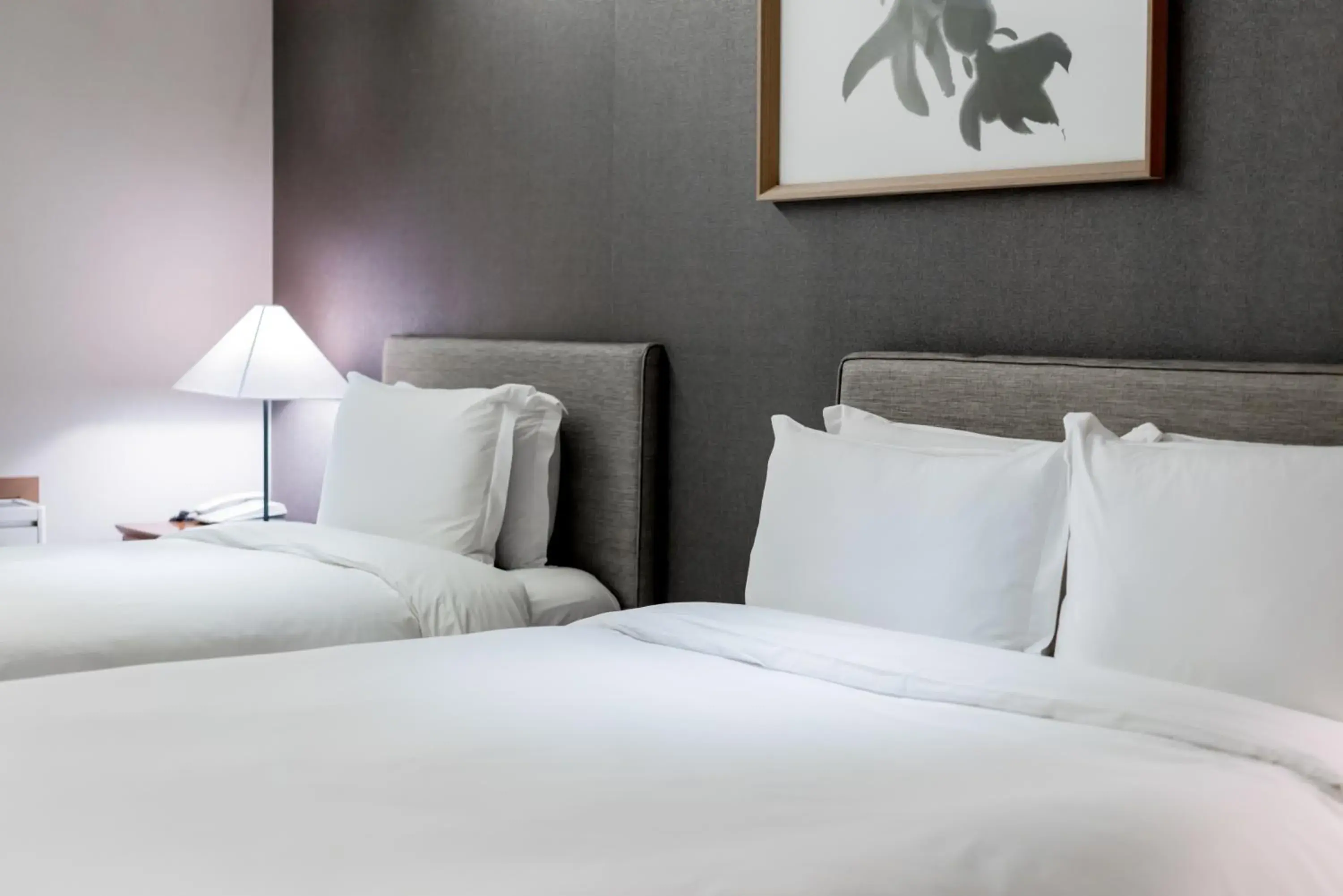 Bed in Oriens Hotel & Residences Myeongdong