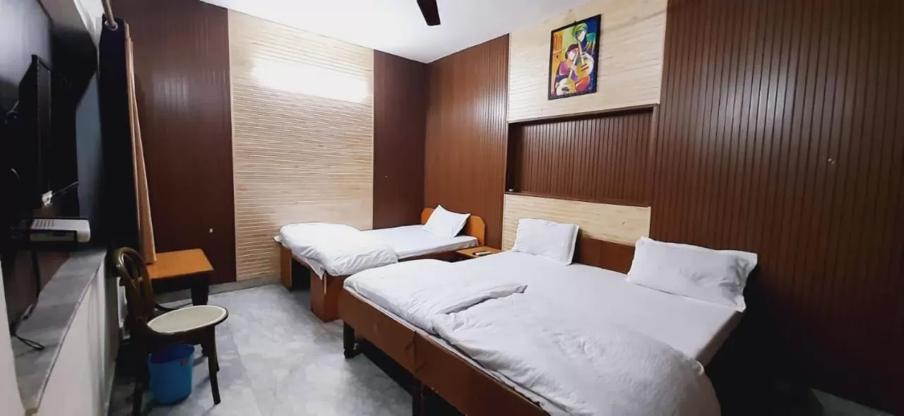 Bed in Gokul guest house