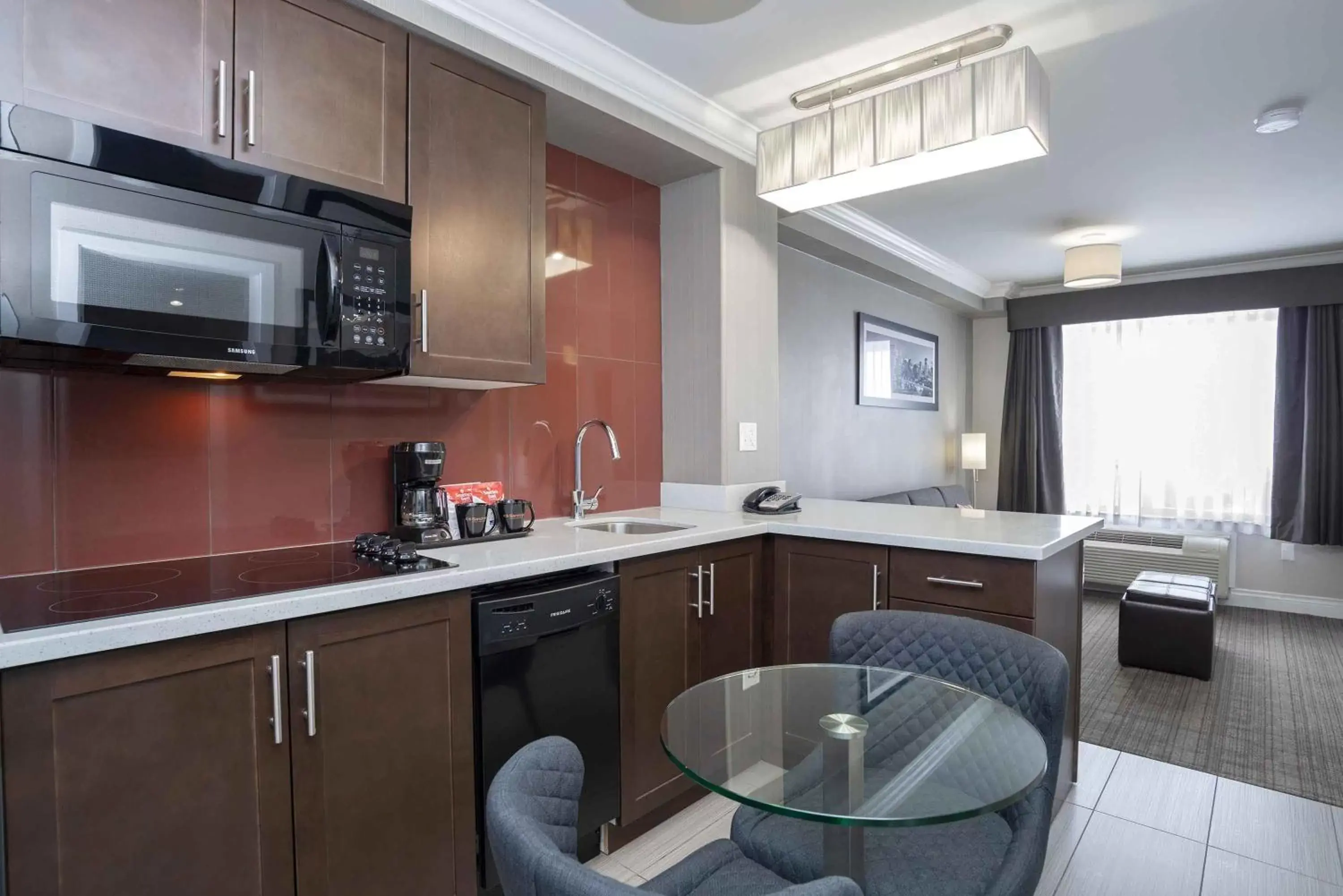 Kitchen or kitchenette in Sandman Hotel & Suites Calgary South