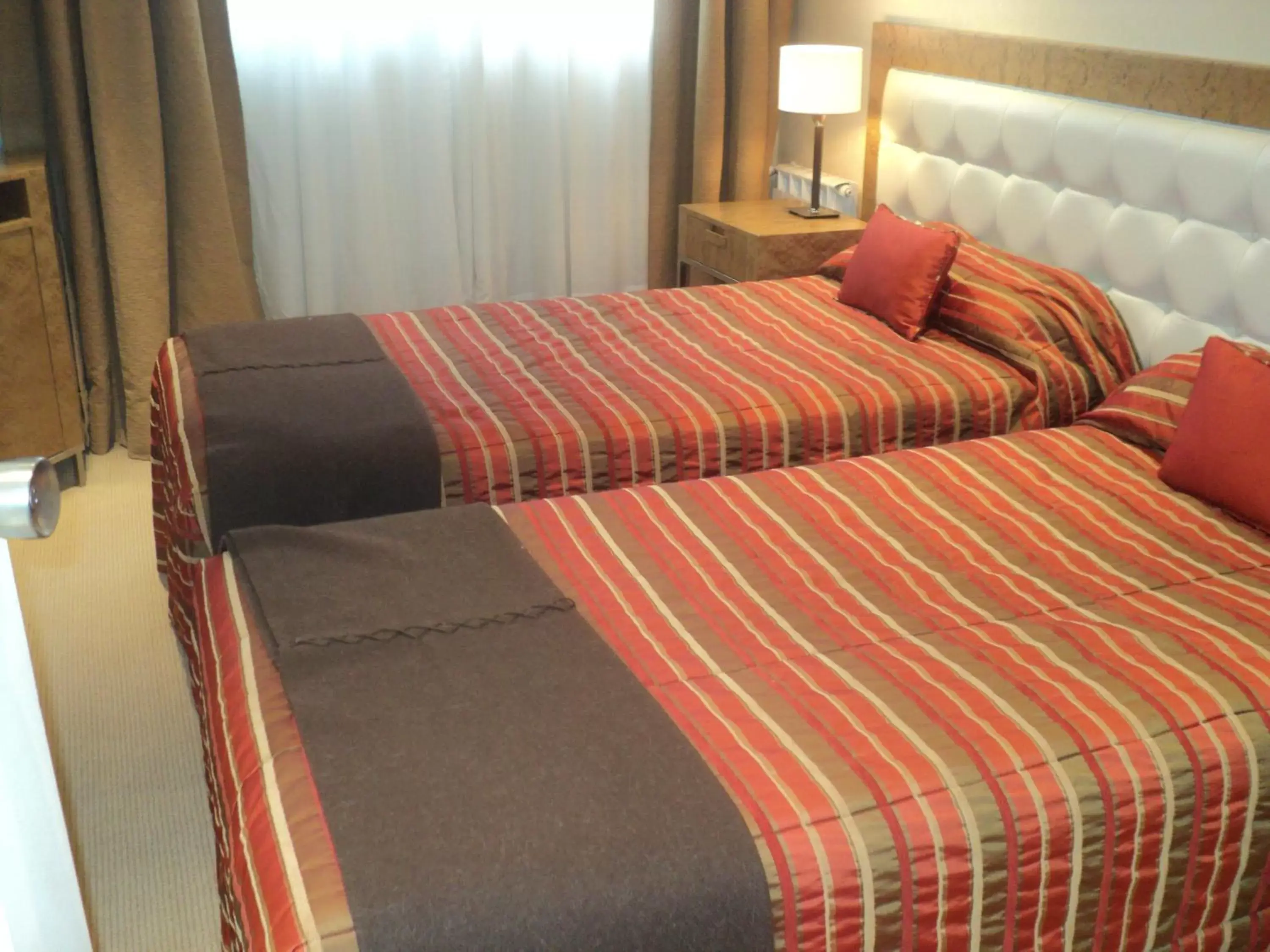 Bed, Room Photo in Fueguino Hotel