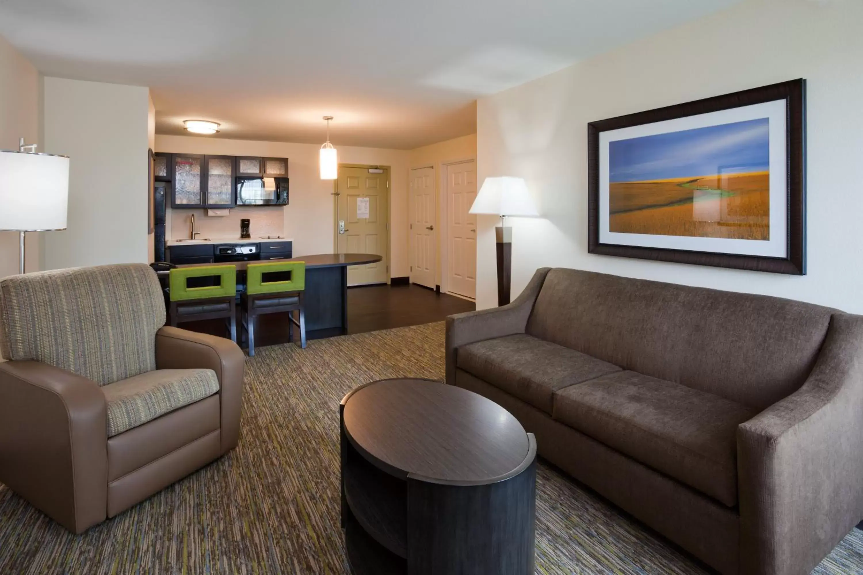 Bedroom, Seating Area in Candlewood Suites Dickinson, an IHG Hotel