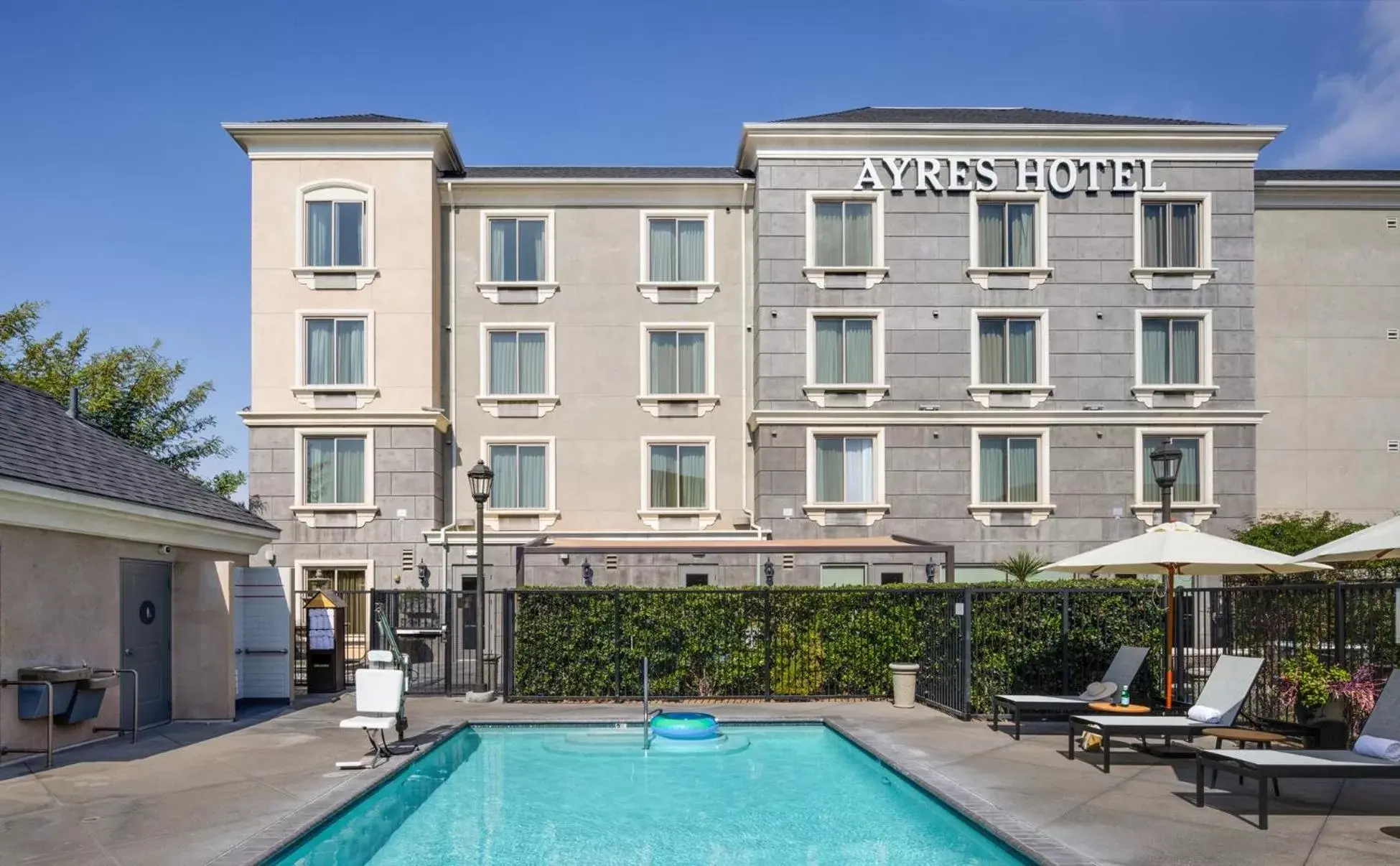 Swimming pool, Property Building in Ayres Hotel Fountain Valley