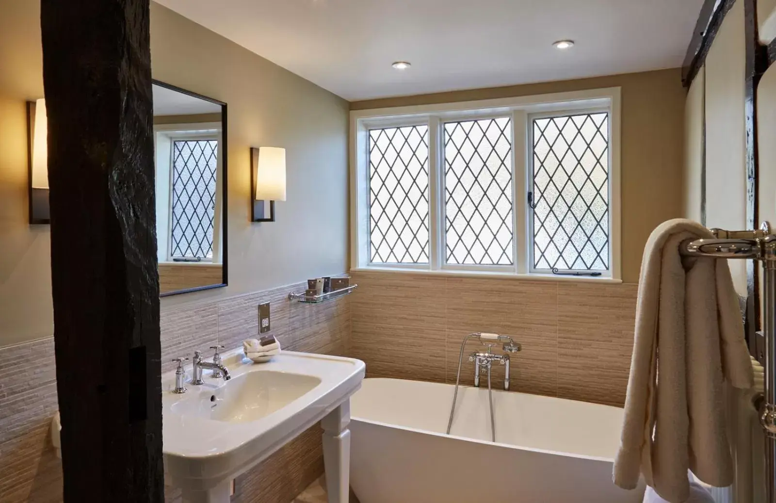 Bathroom in Ockenden Manor Hotel & Spa