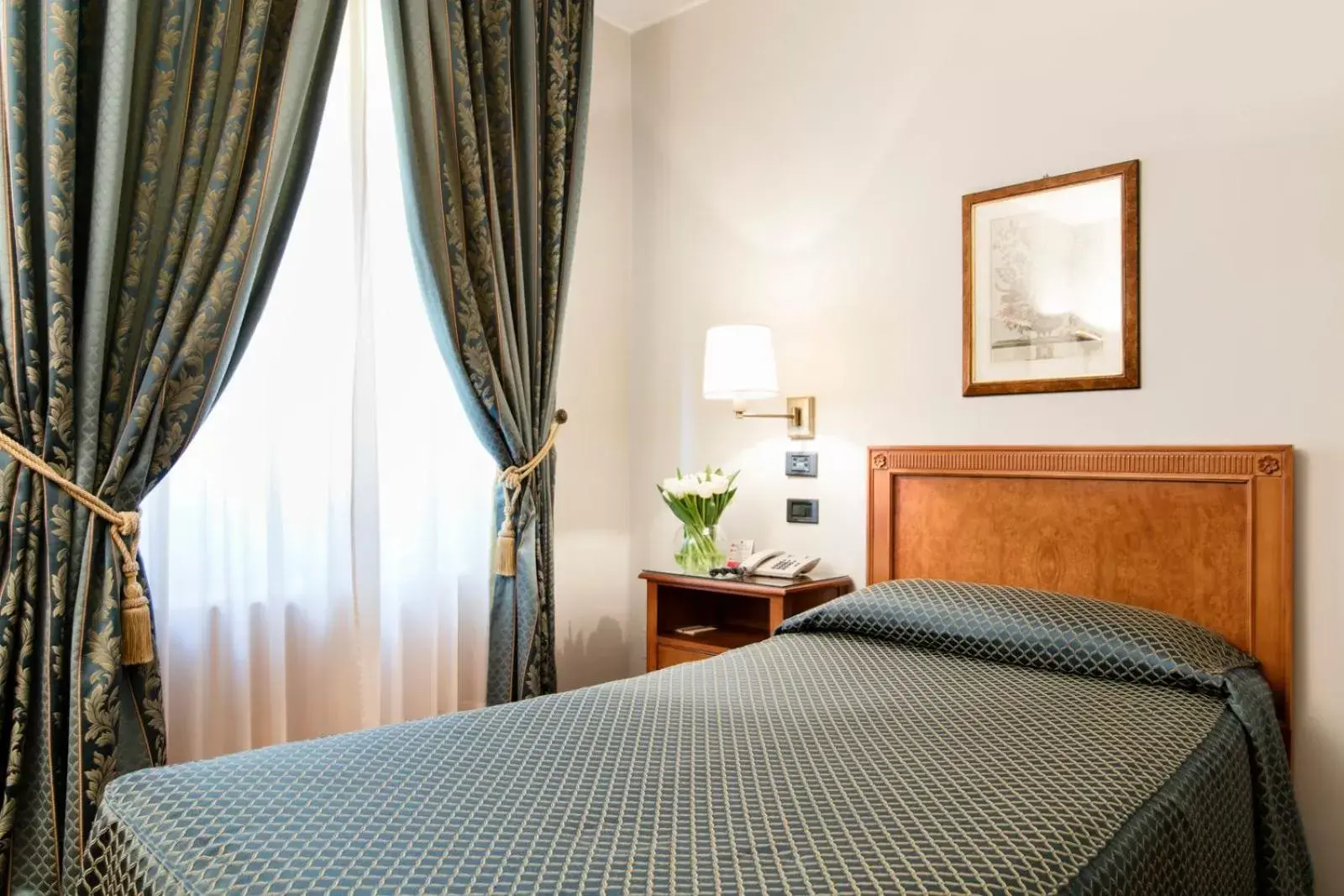 Bed in Albergo Delle Notarie