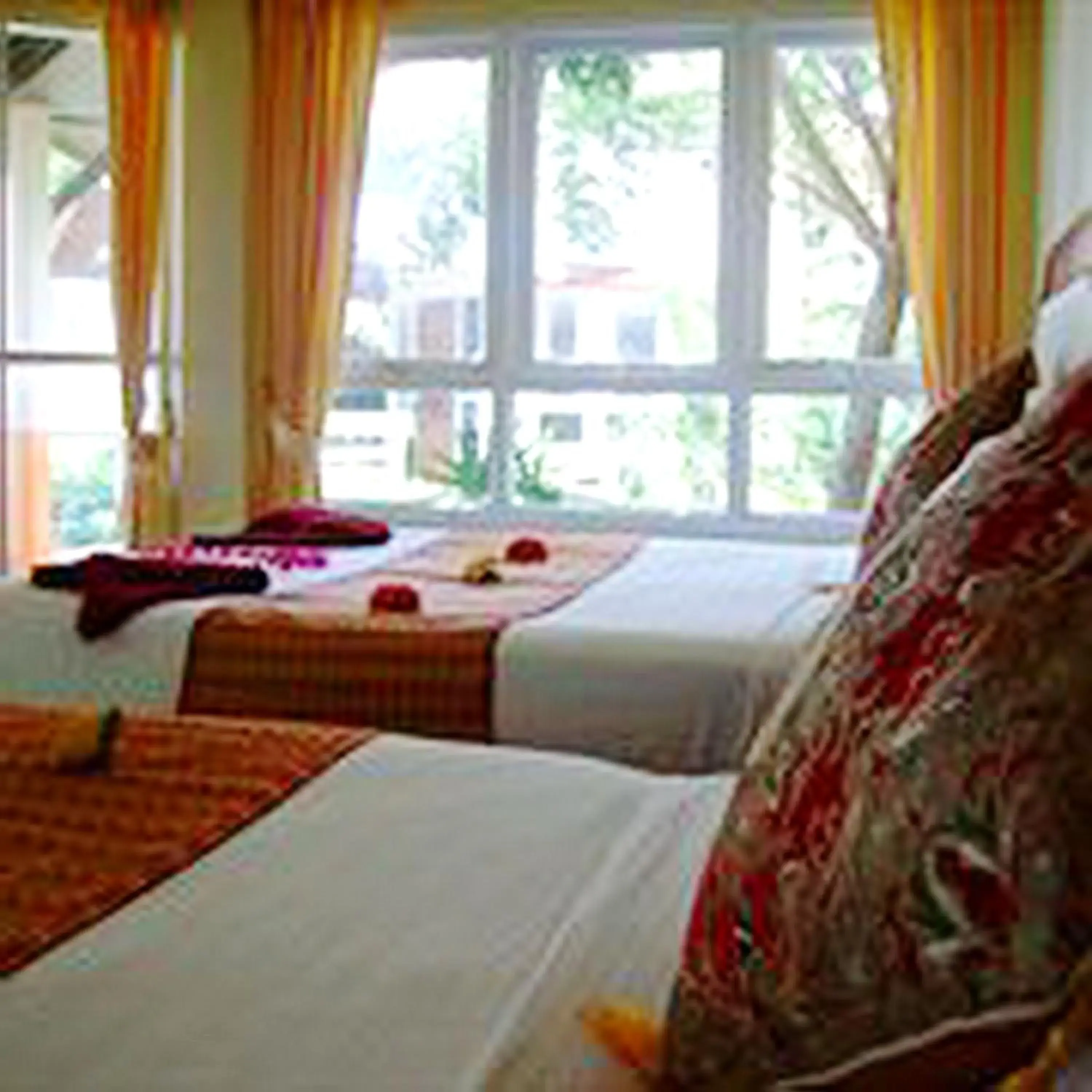 Bed in Lanta Palm Beach Resort