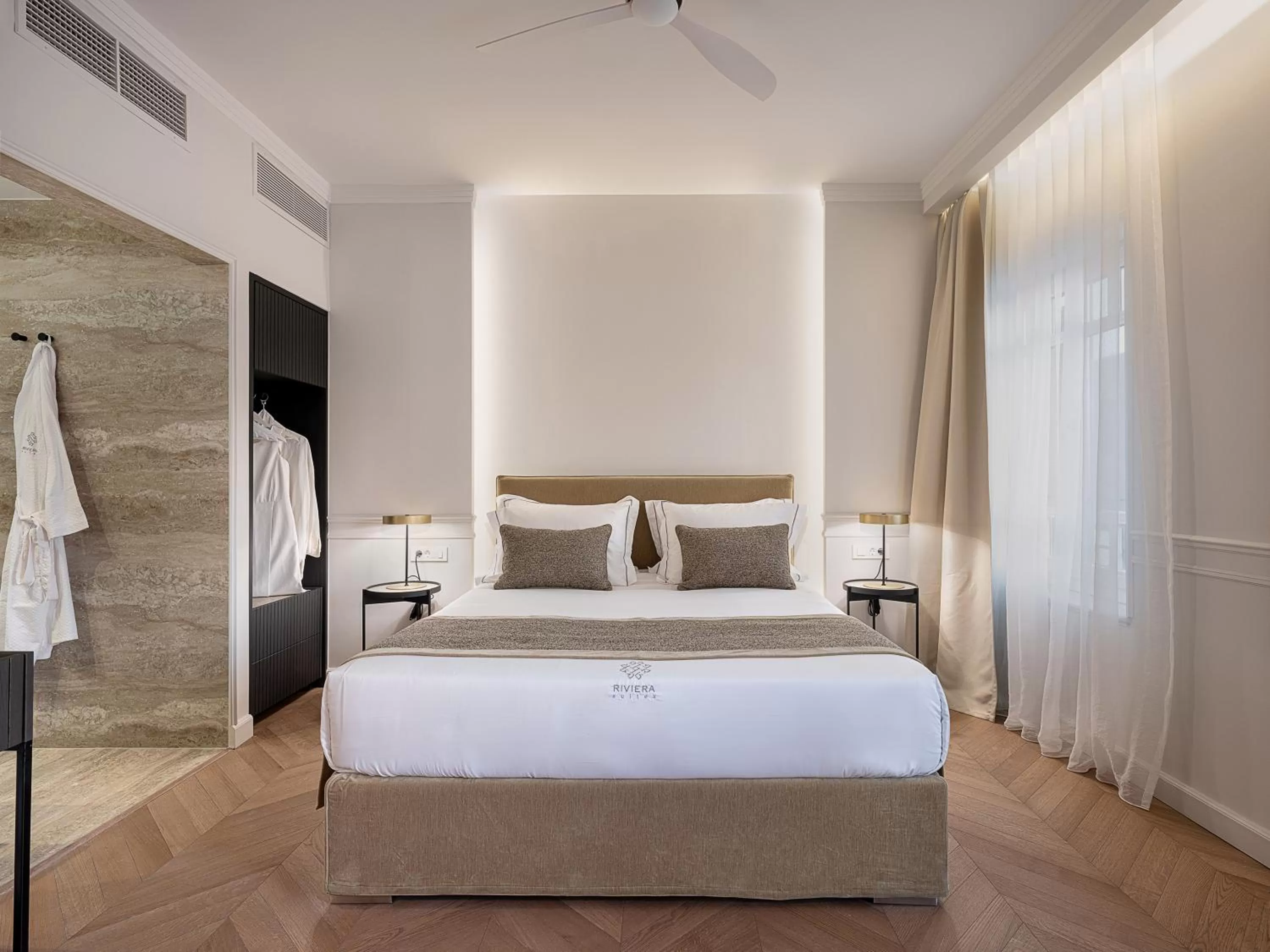 Bed in Riviera Suites