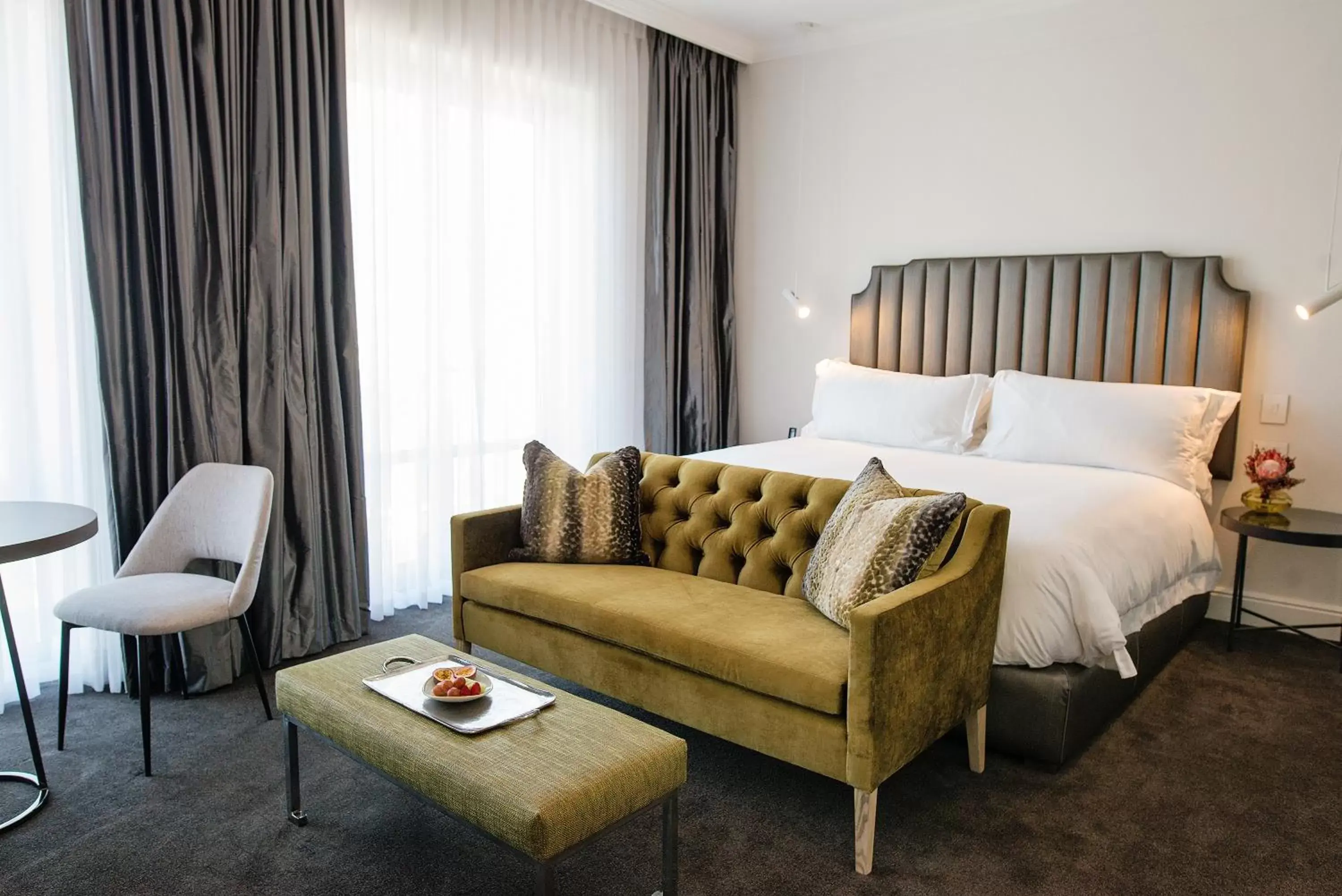 Bedroom, Seating Area in The Manor House at the Queen Victoria Hotel by NEWMARK