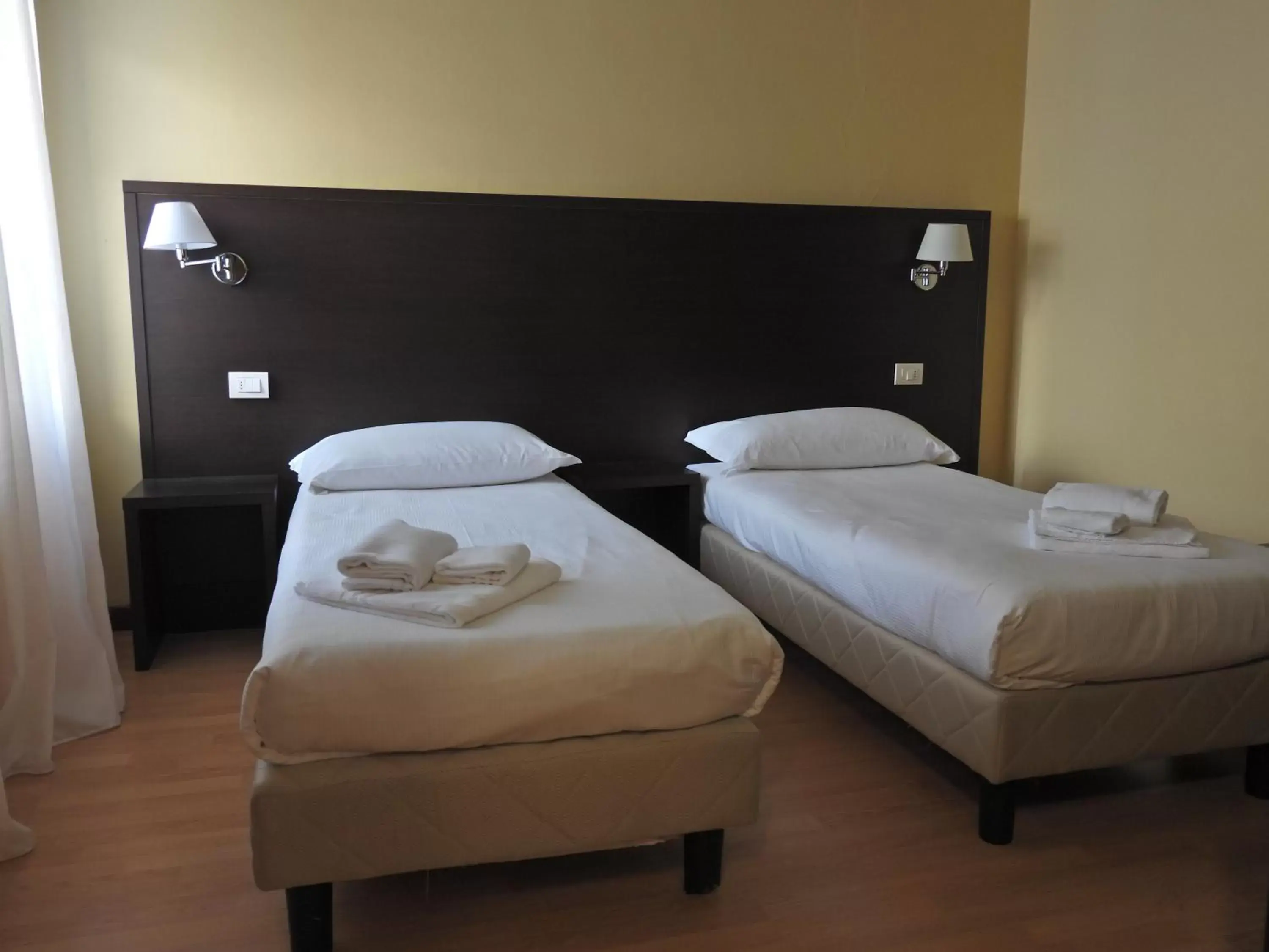 Bed in Hotel Guidi