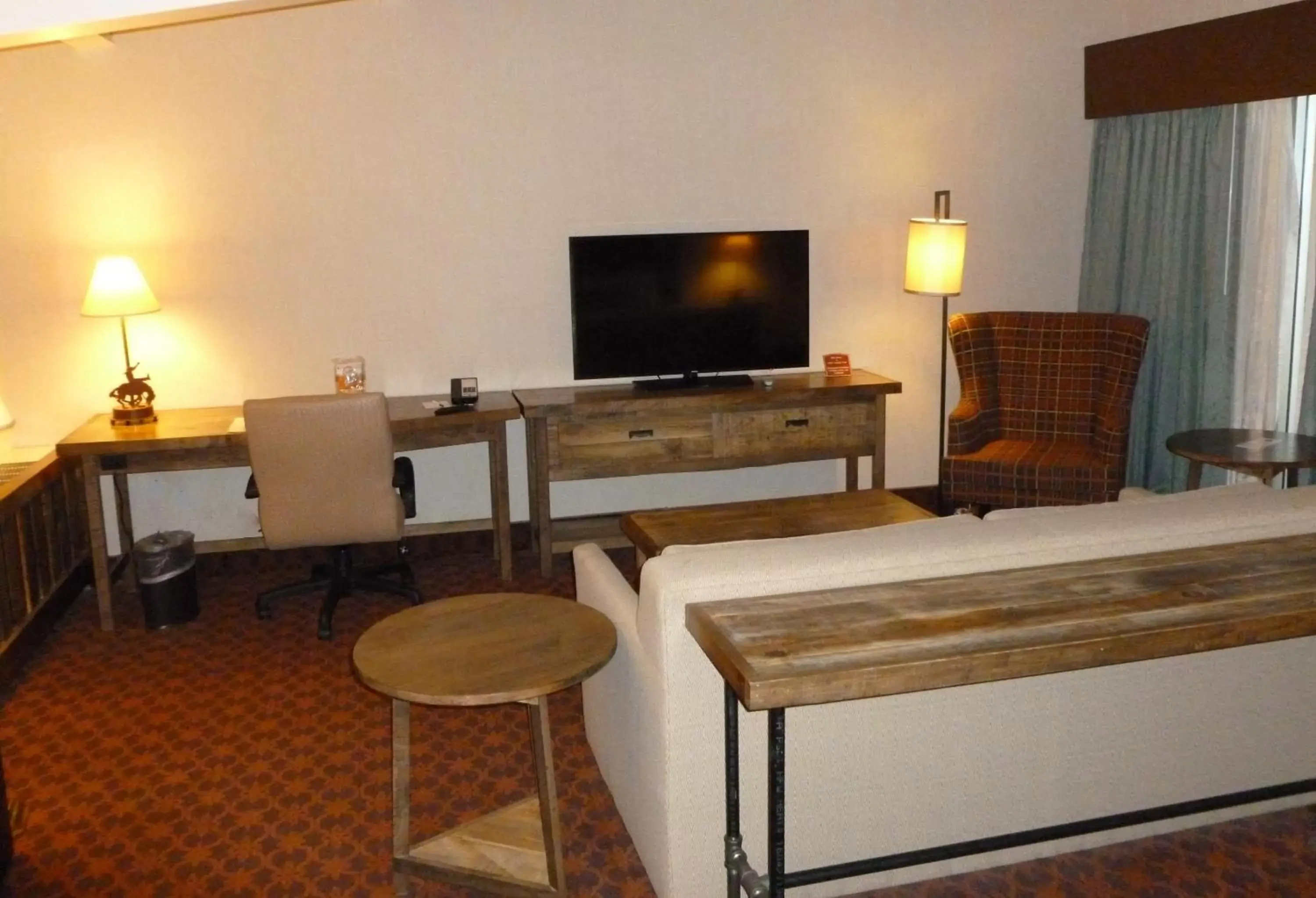 Photo of the whole room, TV/Entertainment Center in Best Western Outlaw Inn