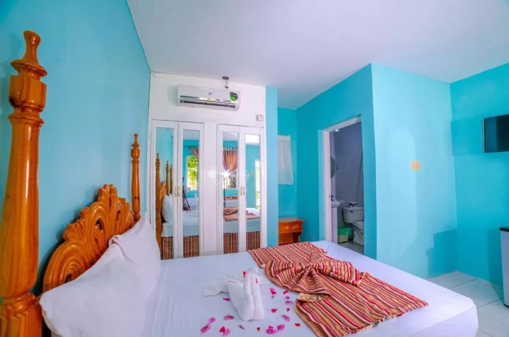 Photo of the whole room, Bed in Tamboo Resort