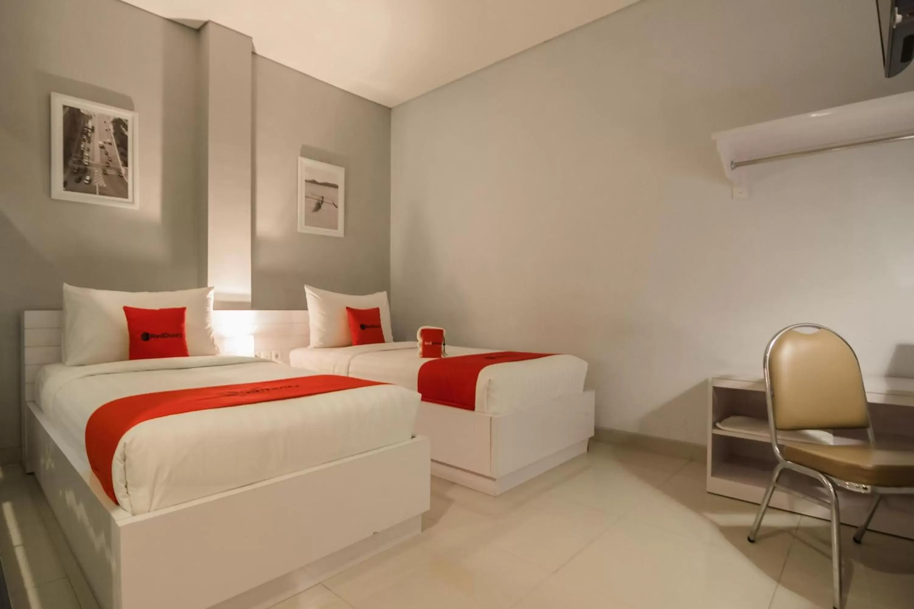 Photo of the whole room, Bed in RedDoorz Plus near Soekarno Hatta Airport 2