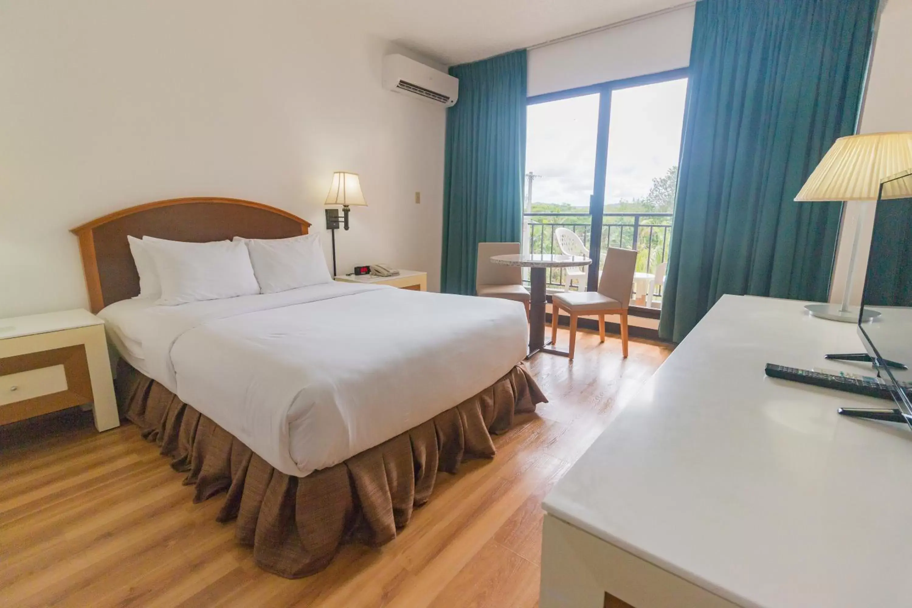 Bed in SureStay Hotel by Best Western Guam Palmridge